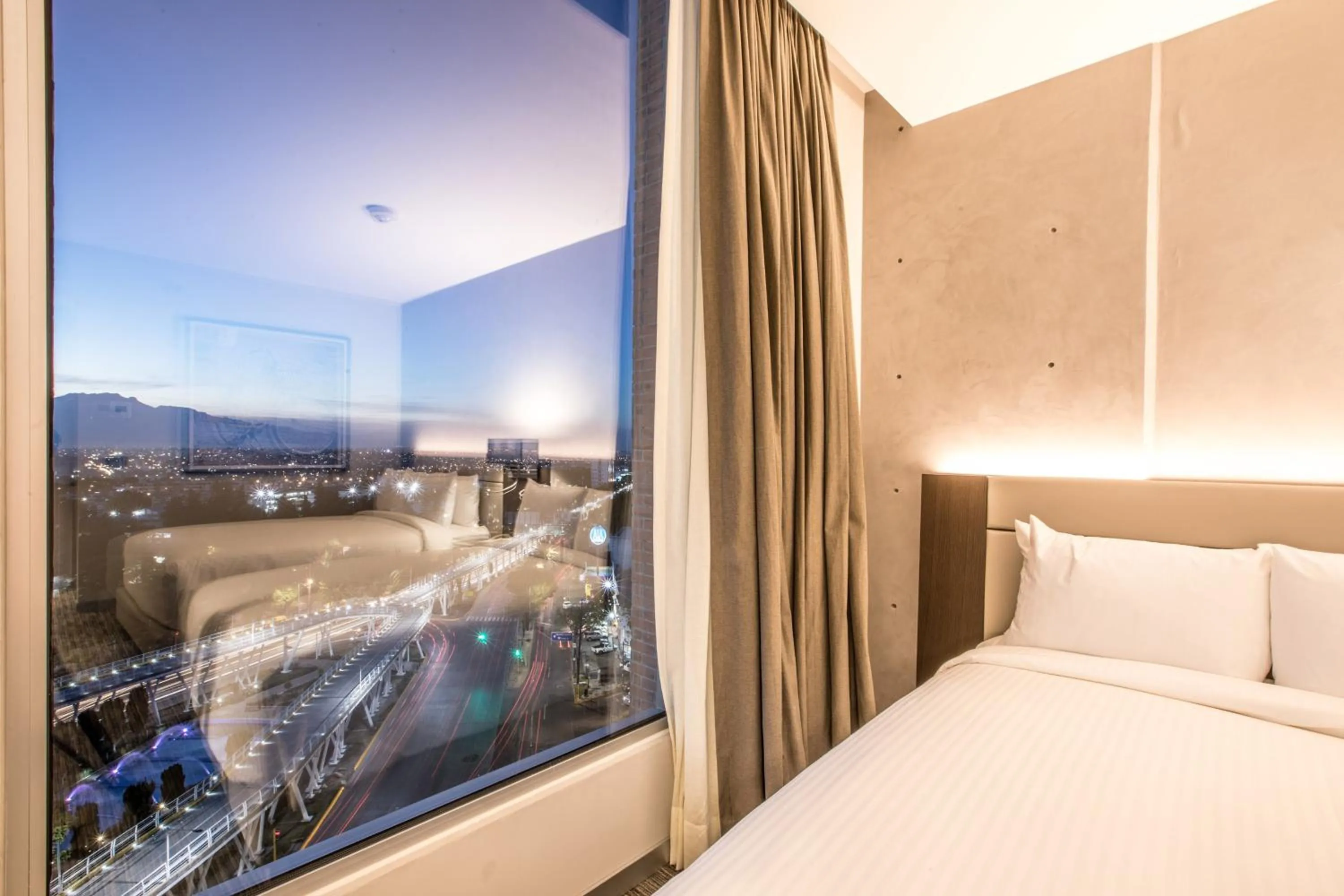 Photo of the whole room, Bed in Four Points by Sheraton Puebla