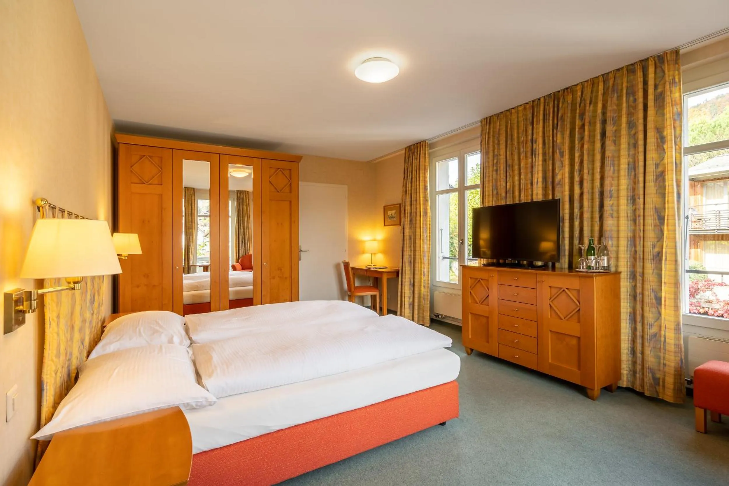 Photo of the whole room, Bed in Schönbühl Hotel & Restaurant Lake Thun