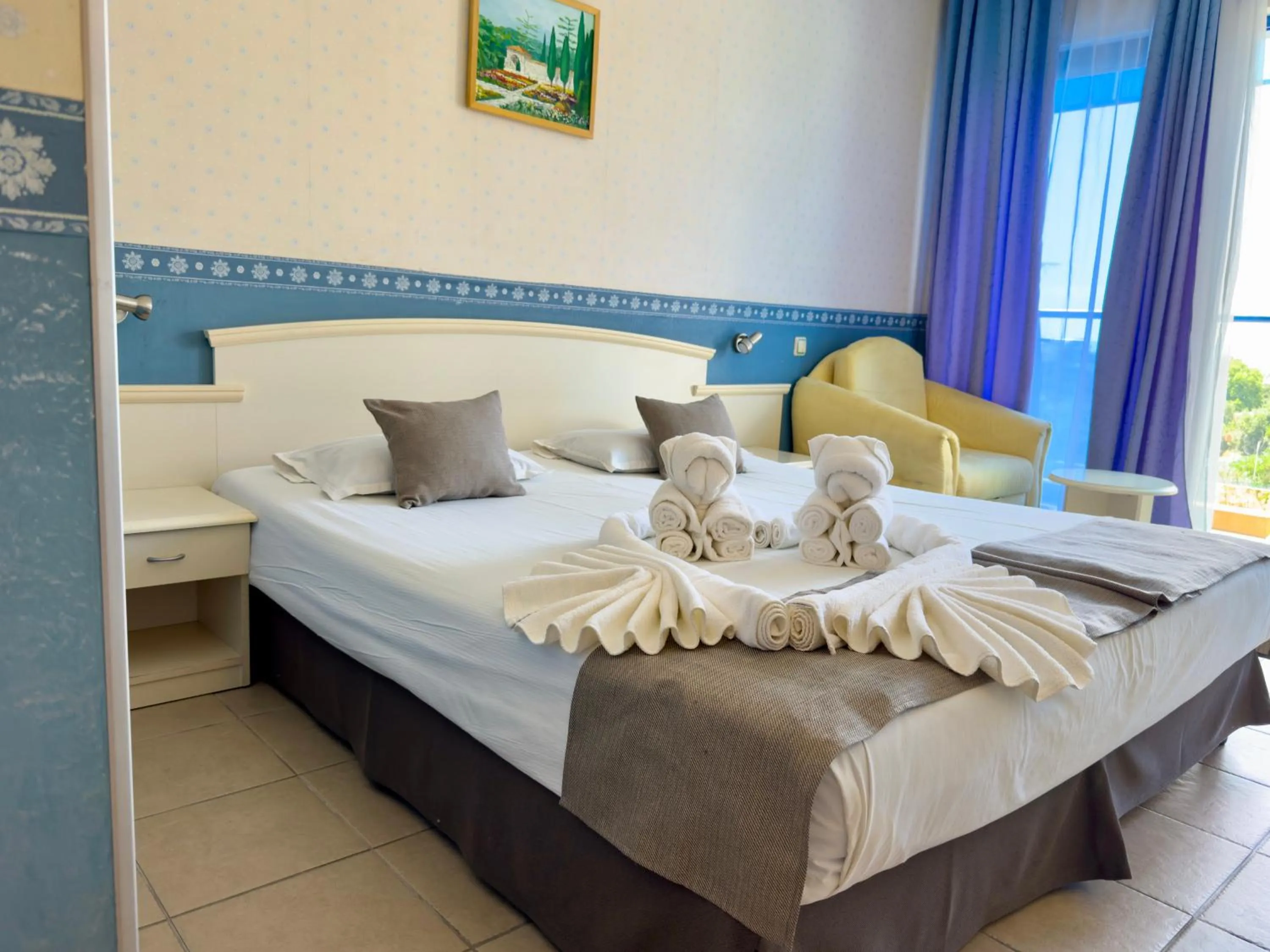 Bed in Aphrodite Hotel