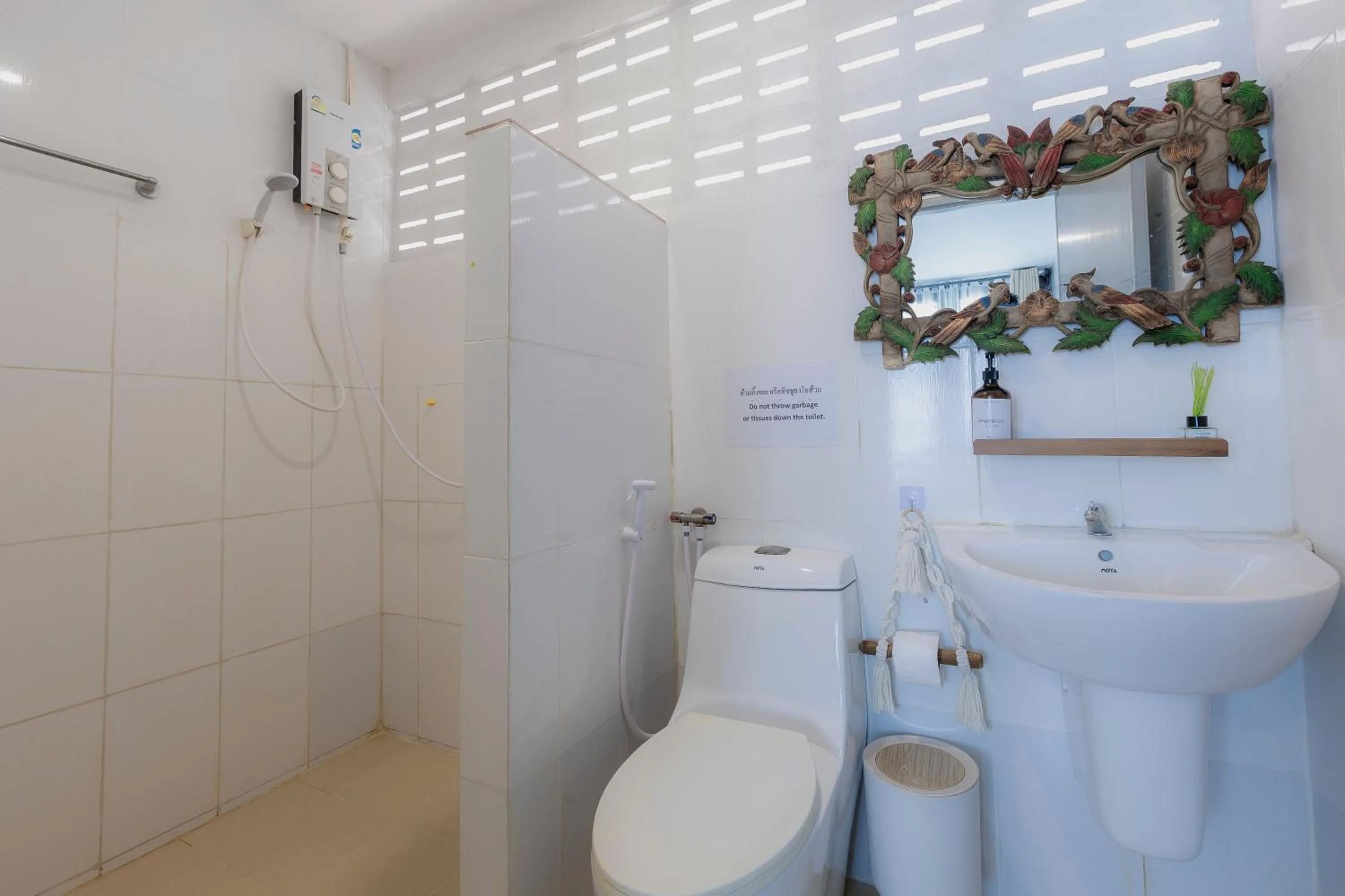 Shower in Phi Phi Cozy Seafront Resort