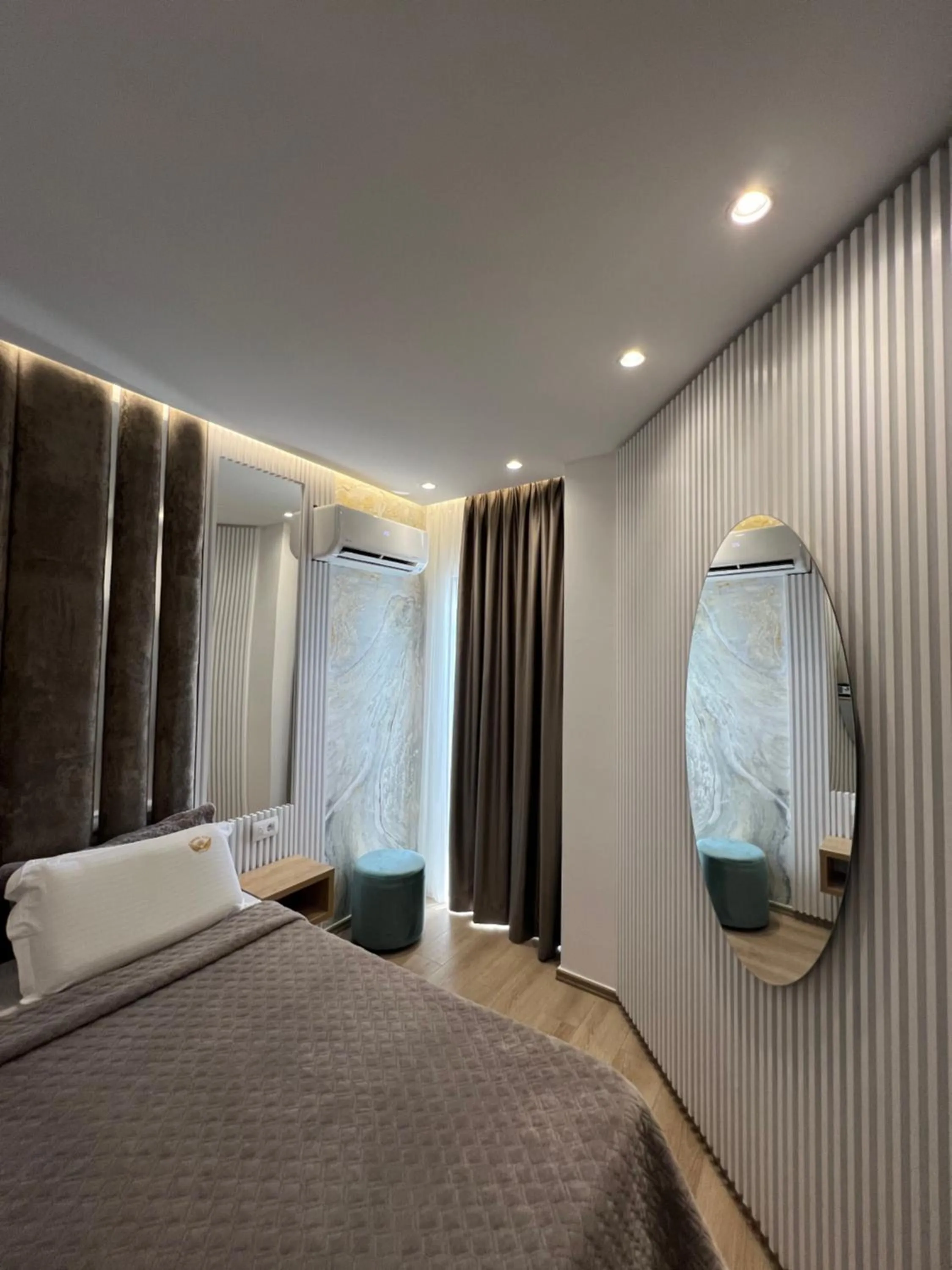 Photo of the whole room, Bed in Ilio Boutique Hotel