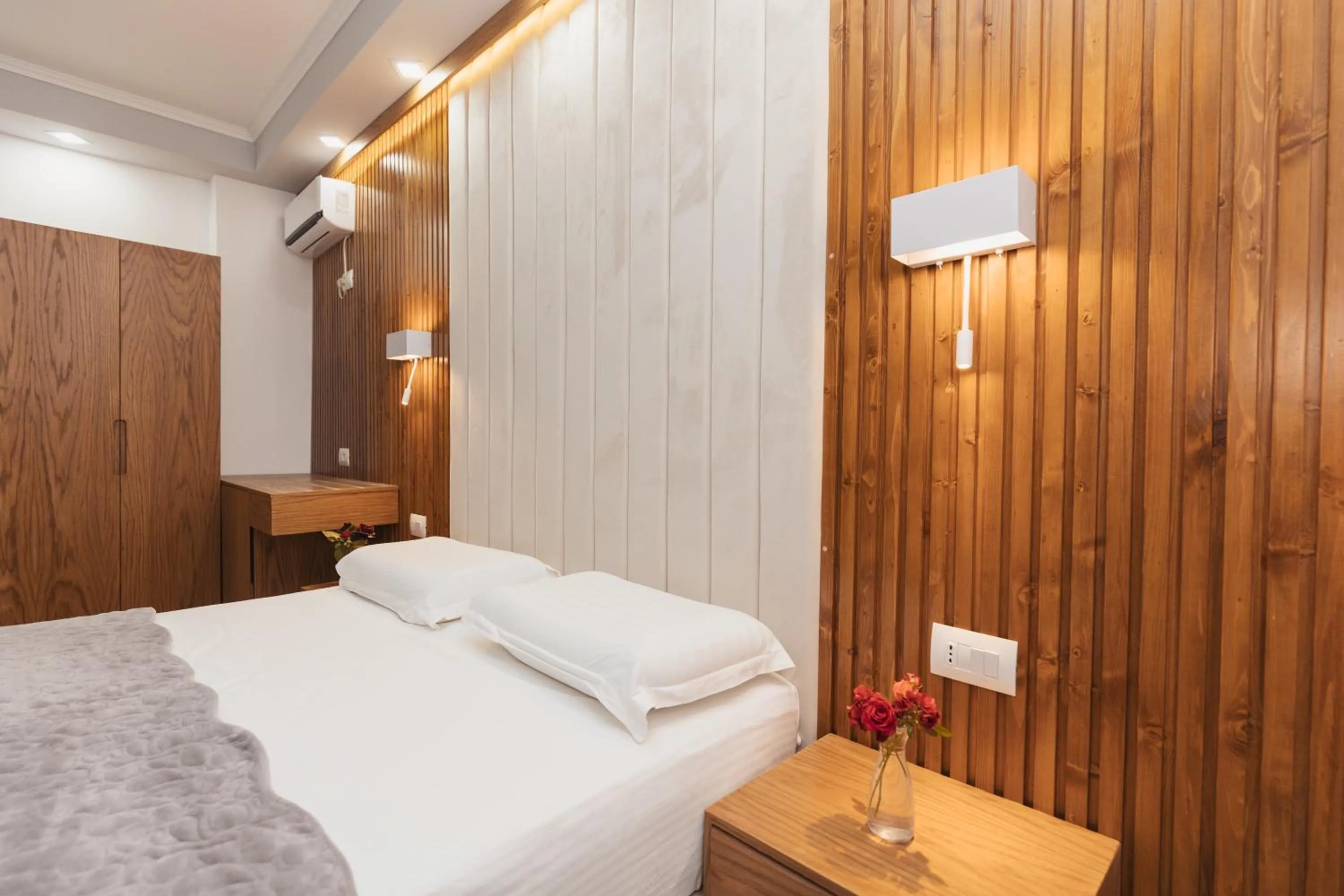 Bed in Ilio Boutique Hotel