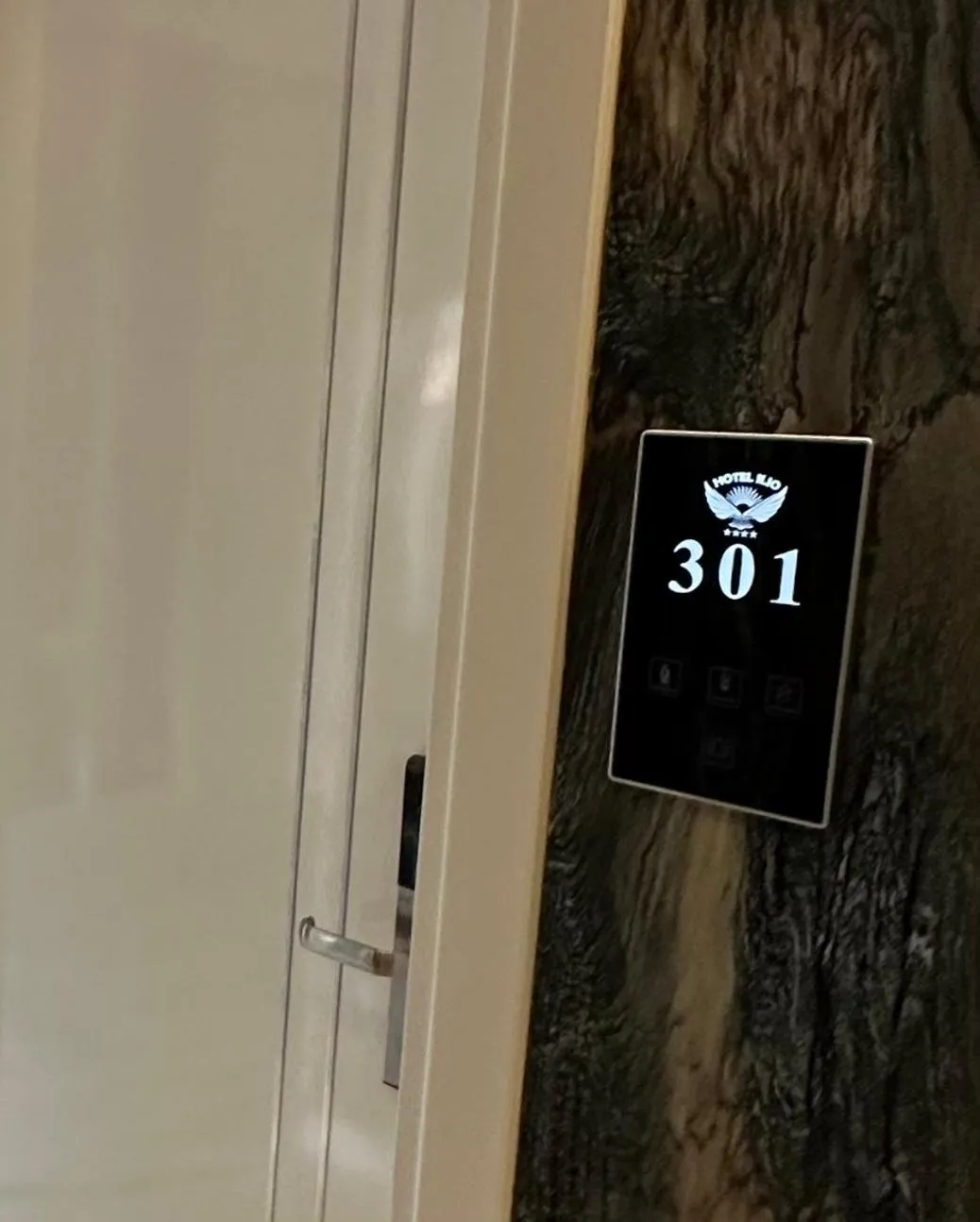 Property logo or sign in Ilio Boutique Hotel