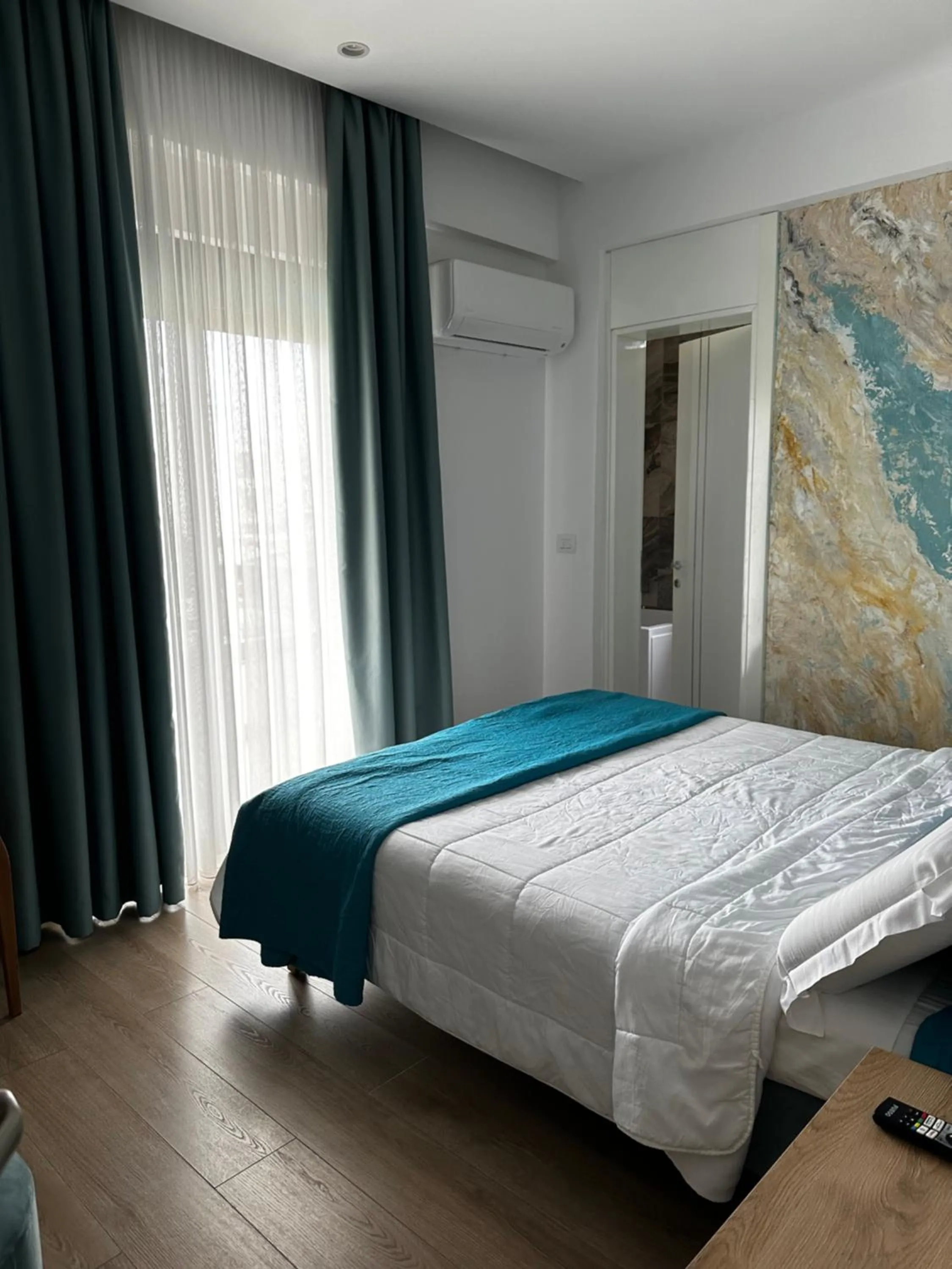 Photo of the whole room, Bed in Ilio Boutique Hotel