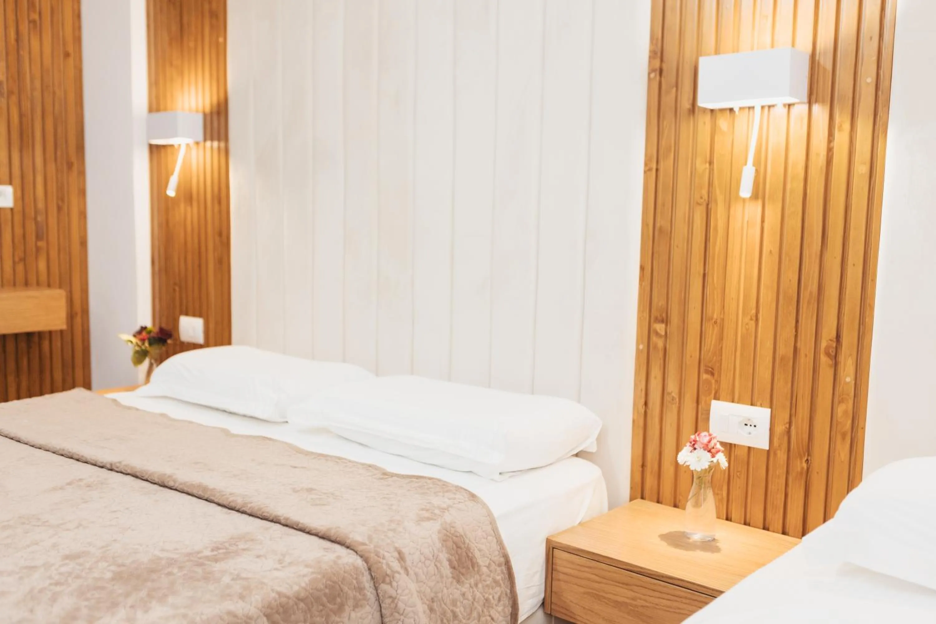 Bed in Ilio Boutique Hotel