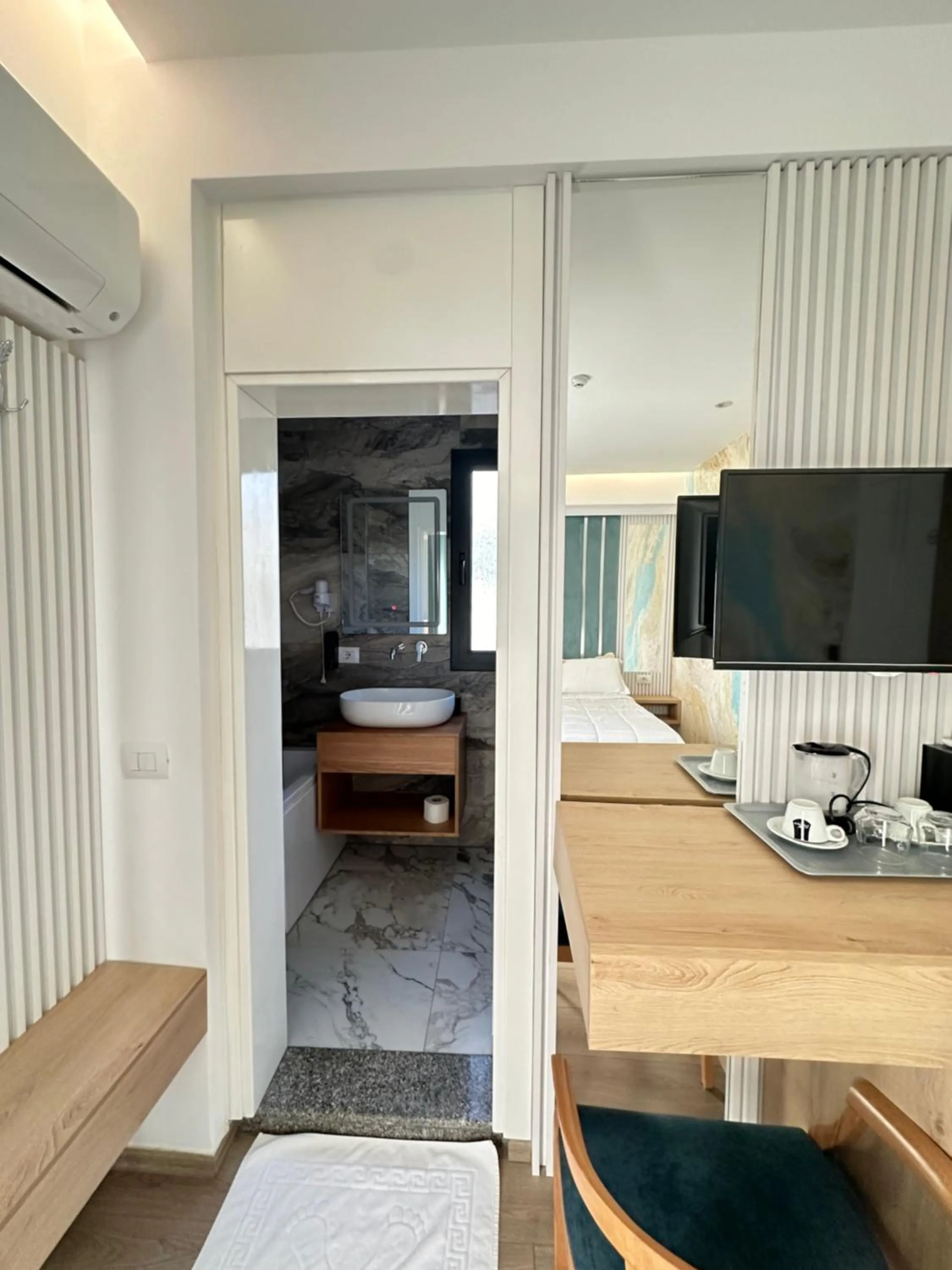 Bed in Ilio Boutique Hotel