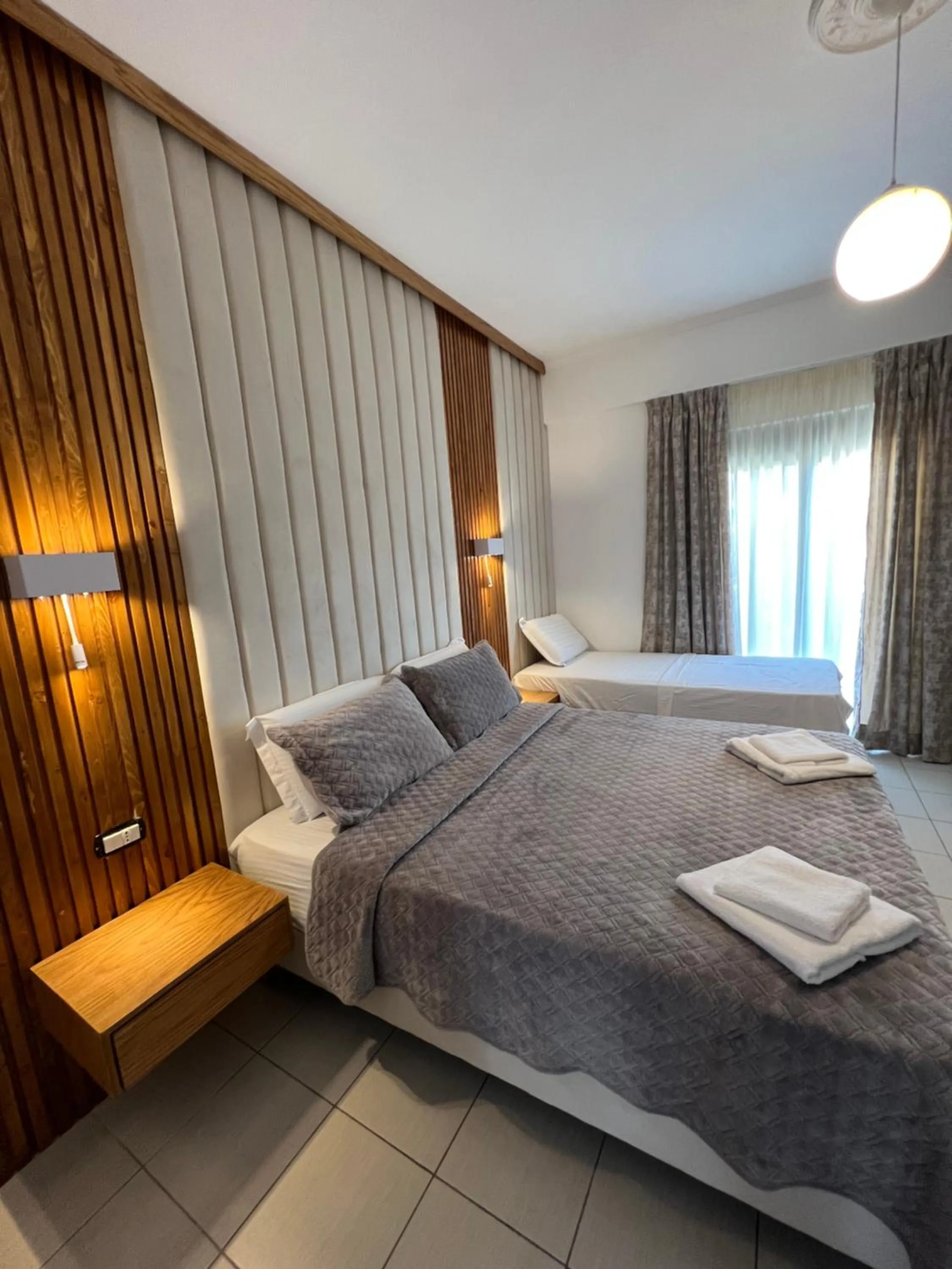 Bed in Ilio Boutique Hotel