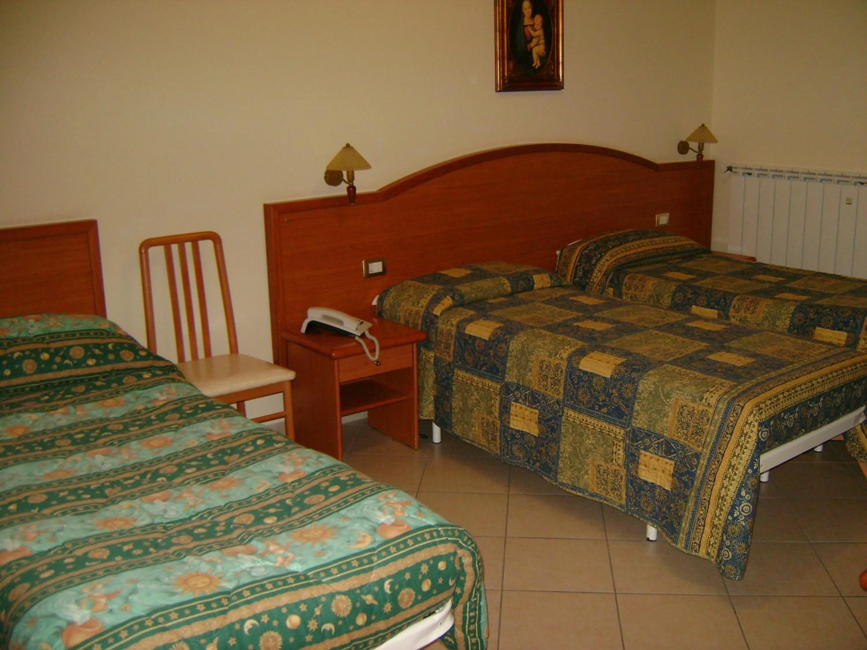 Bed in Hotel Continental