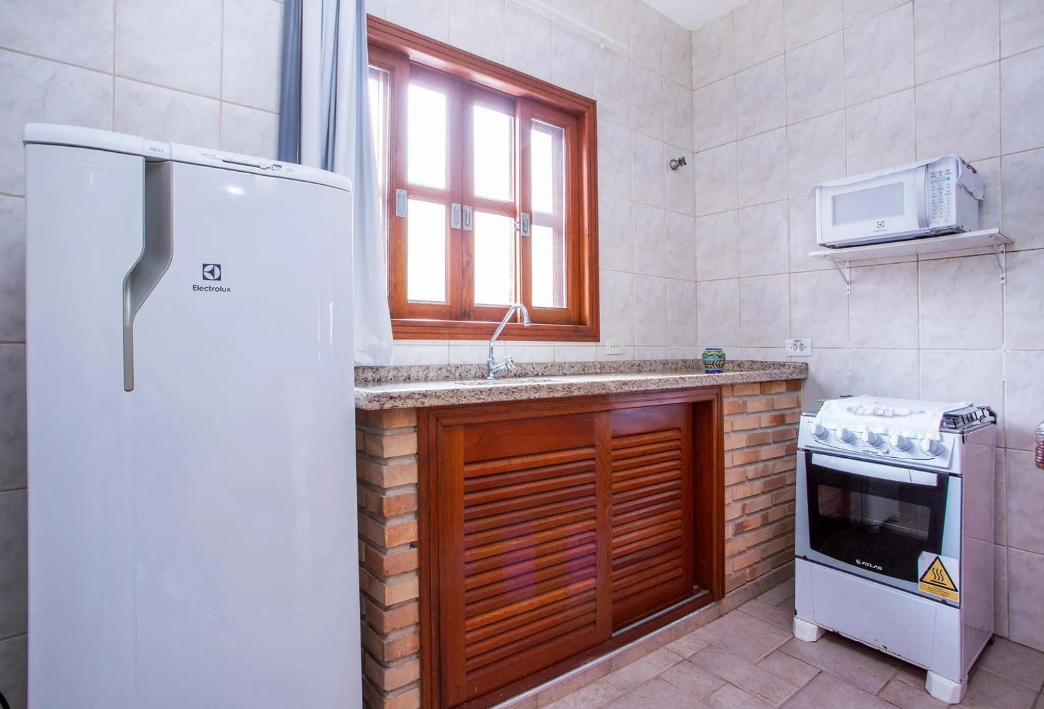 Kitchen or kitchenette in Pousada Villa Blu Maresias