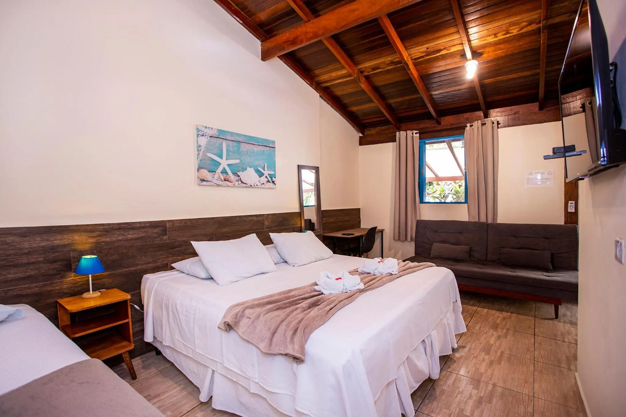 Photo of the whole room, Bed in Pousada Villa Blu Maresias