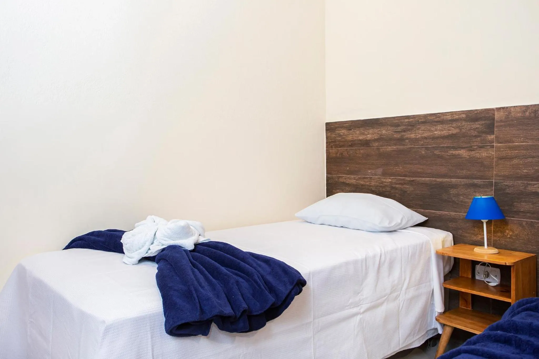 Bed in Pousada Villa Blu Maresias