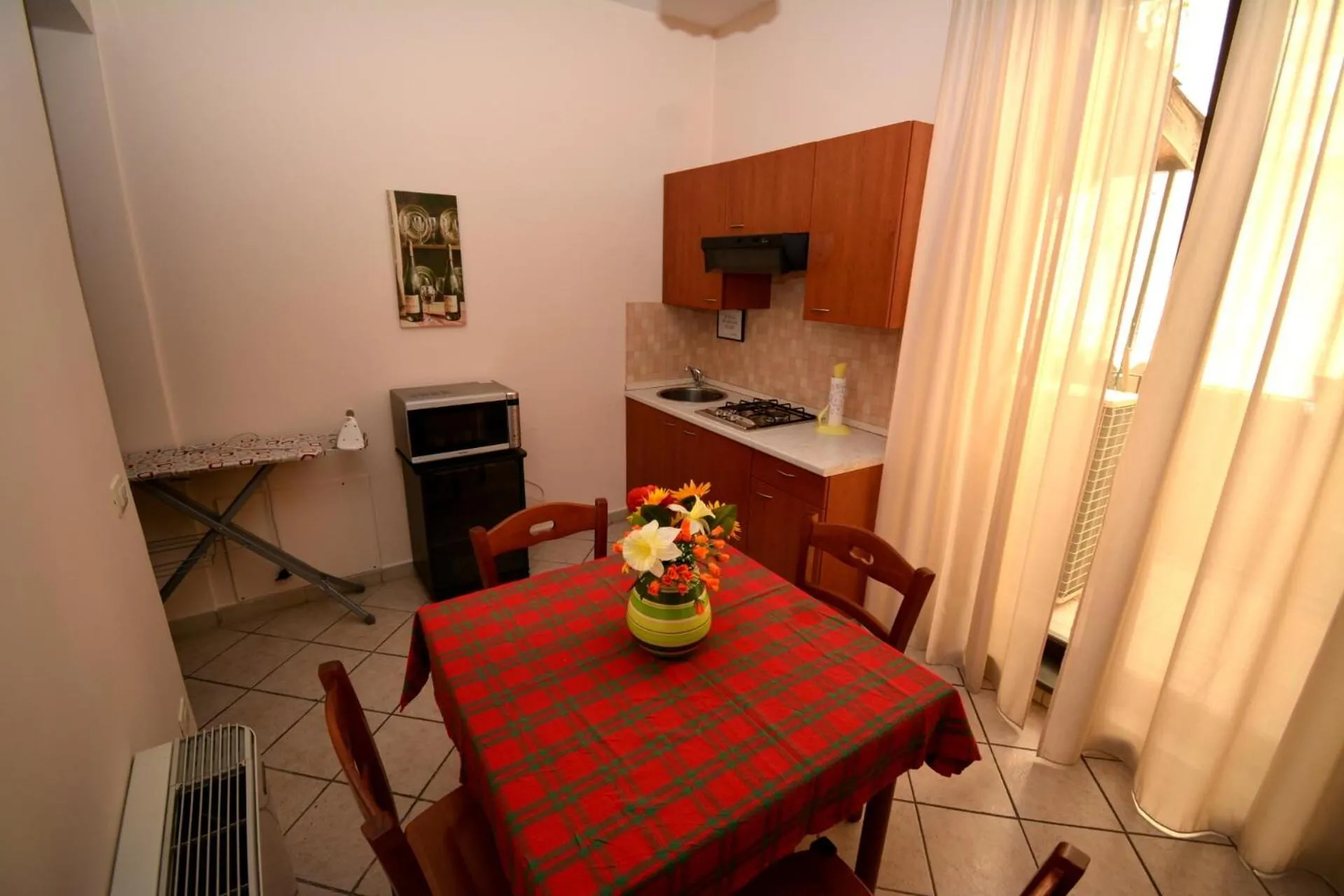 Communal kitchen in Affittacamere La Piazzetta