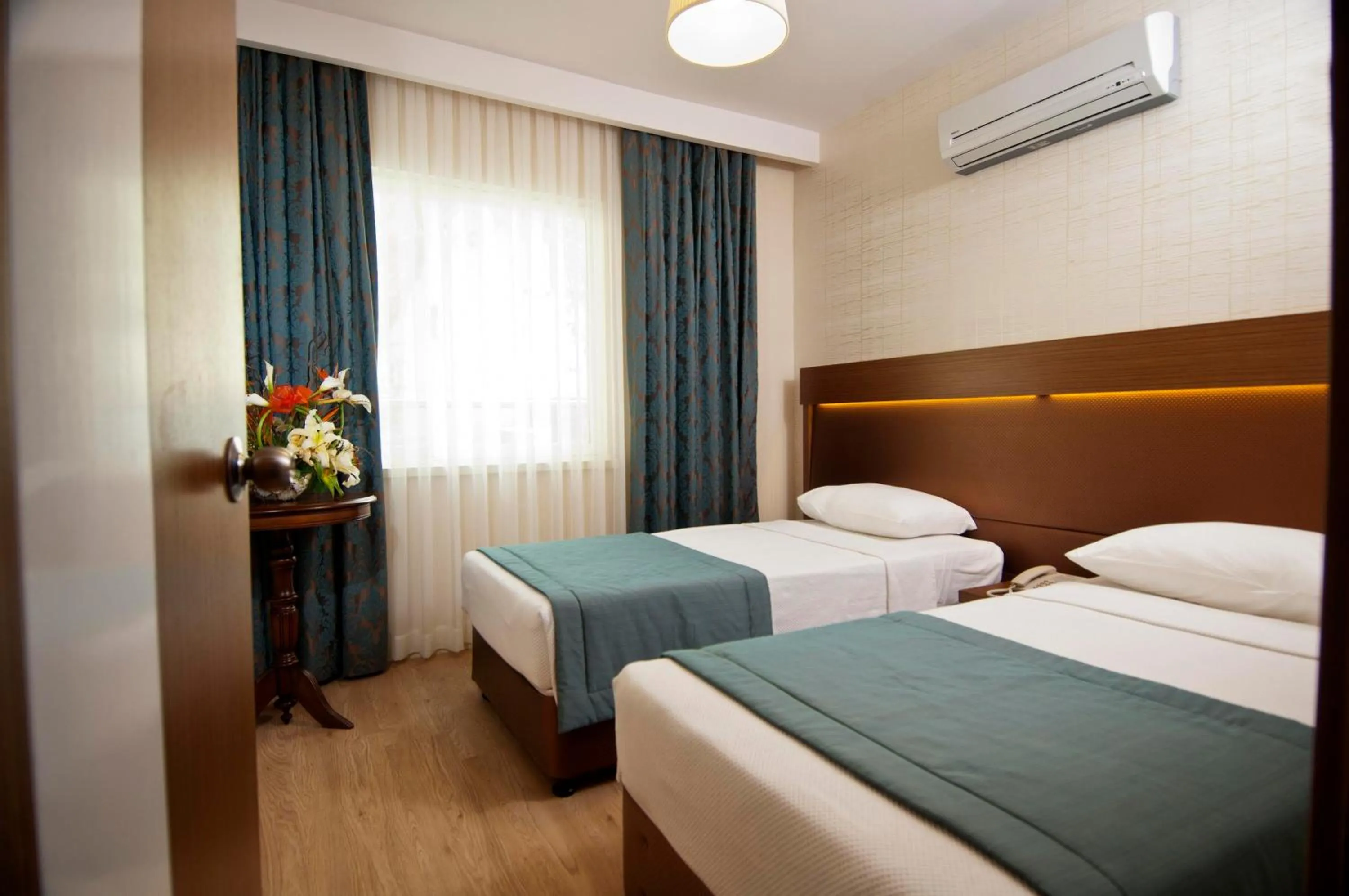 Bed in Supreme Hotel