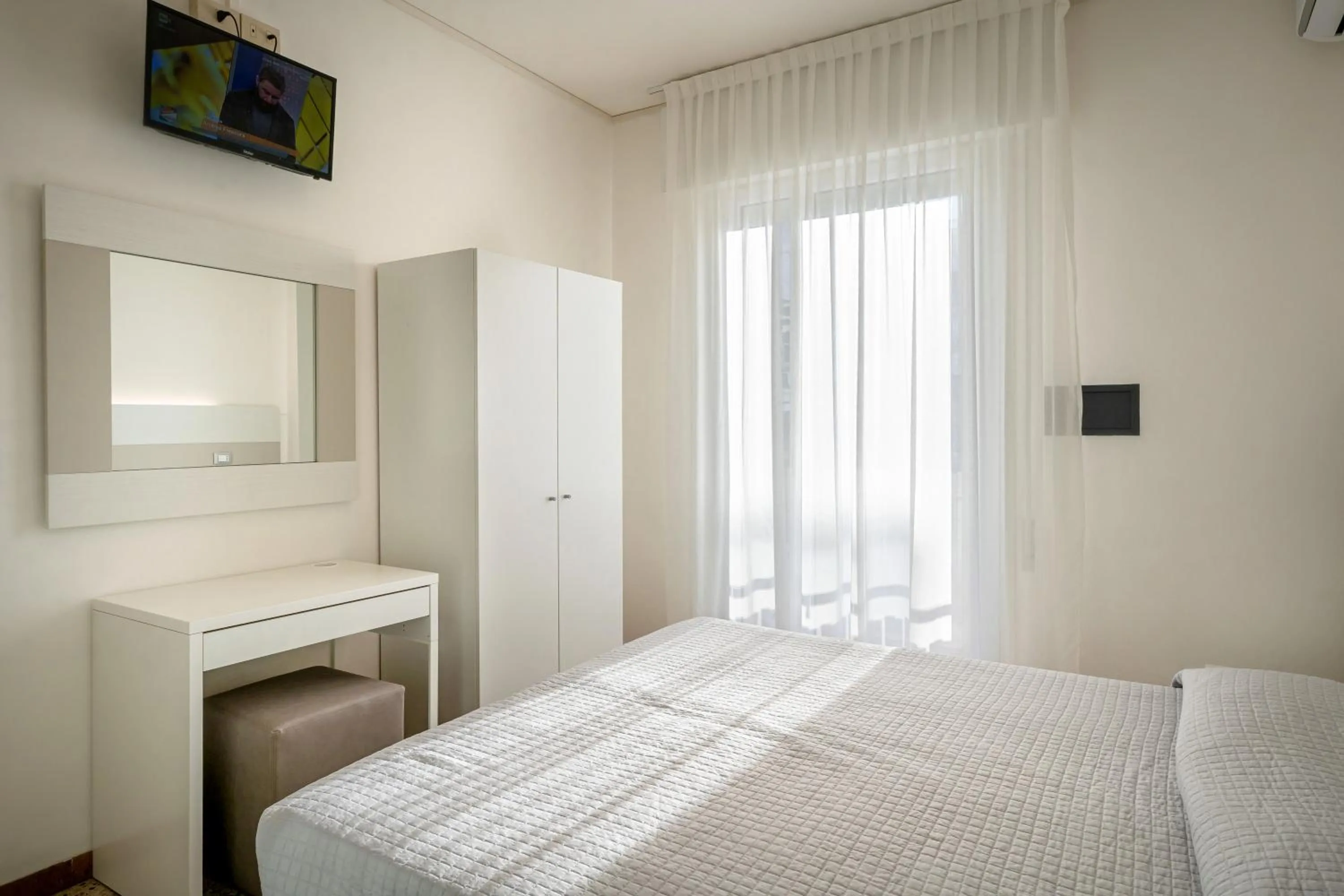 Bed in Hotel Portofino