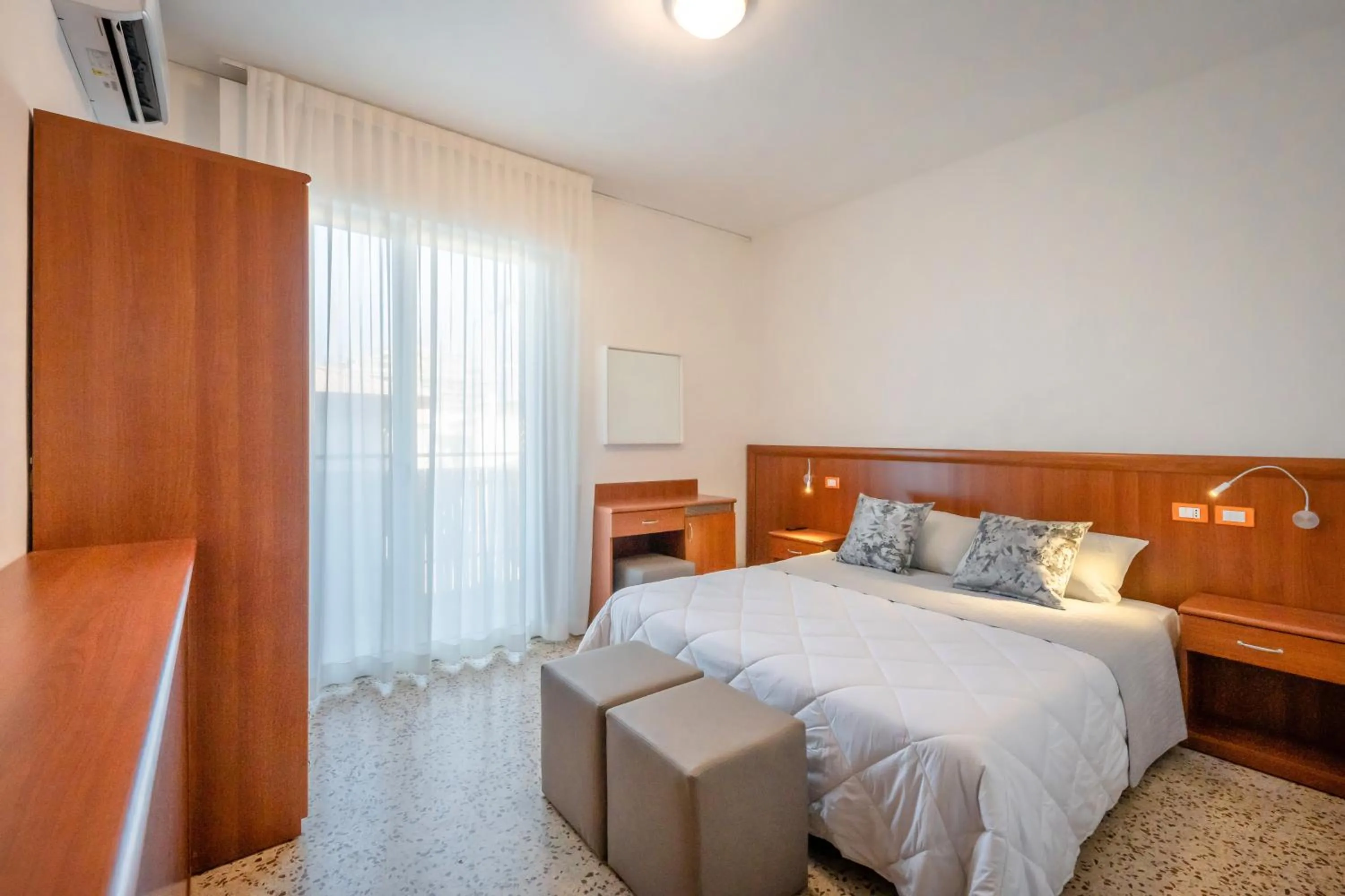 Bed in Hotel Portofino