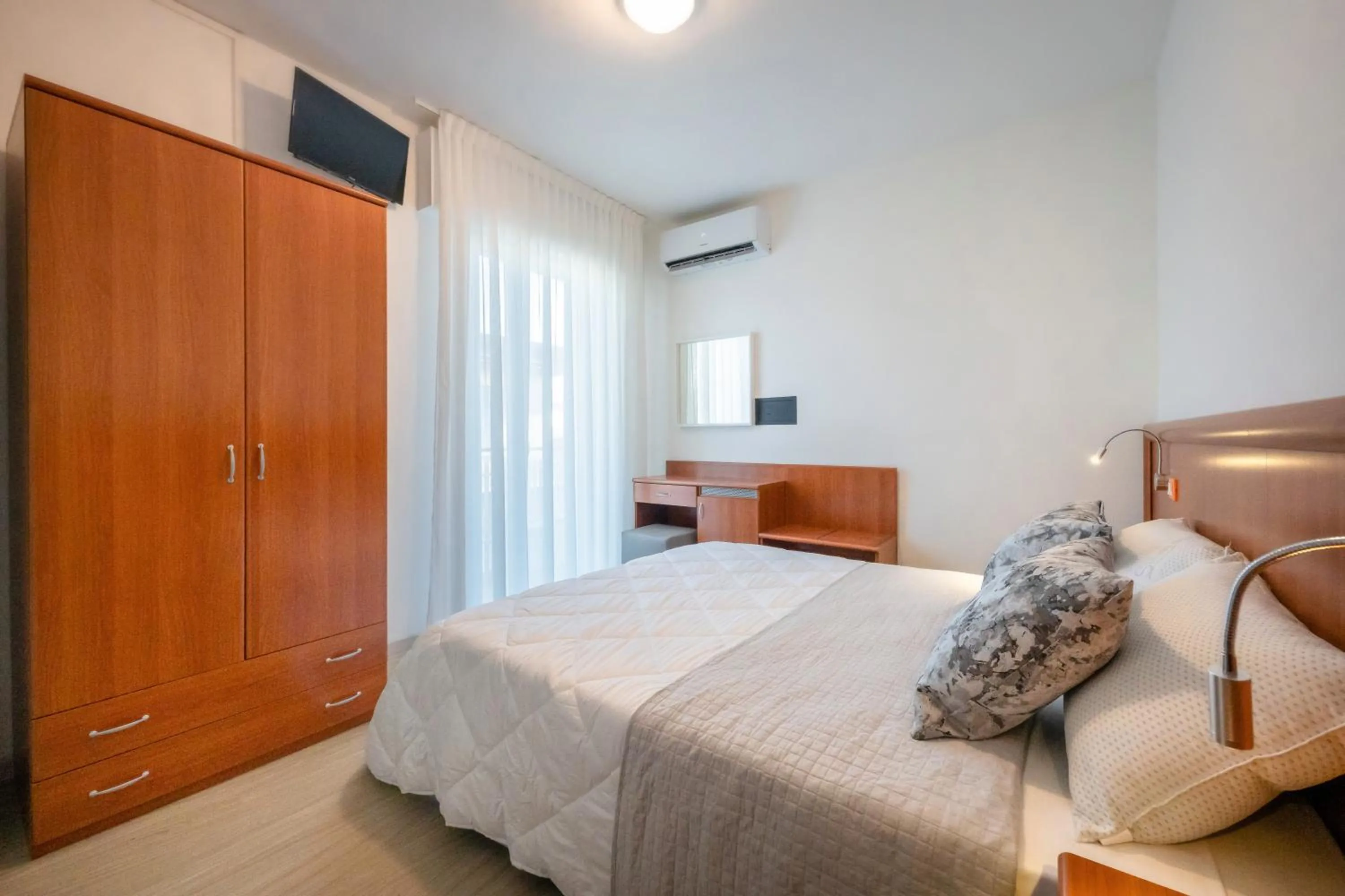 Bed in Hotel Portofino