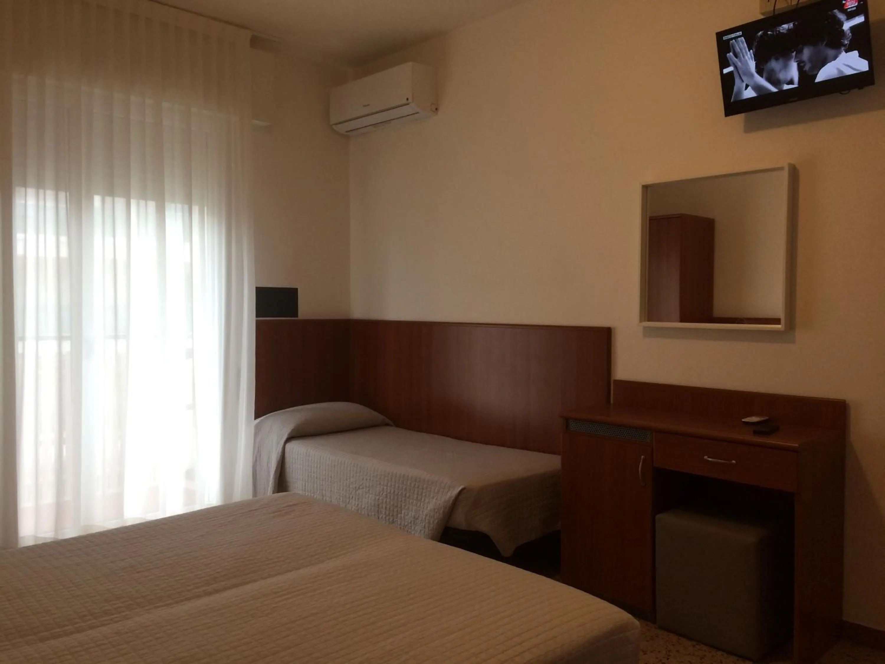 Bed in Hotel Portofino