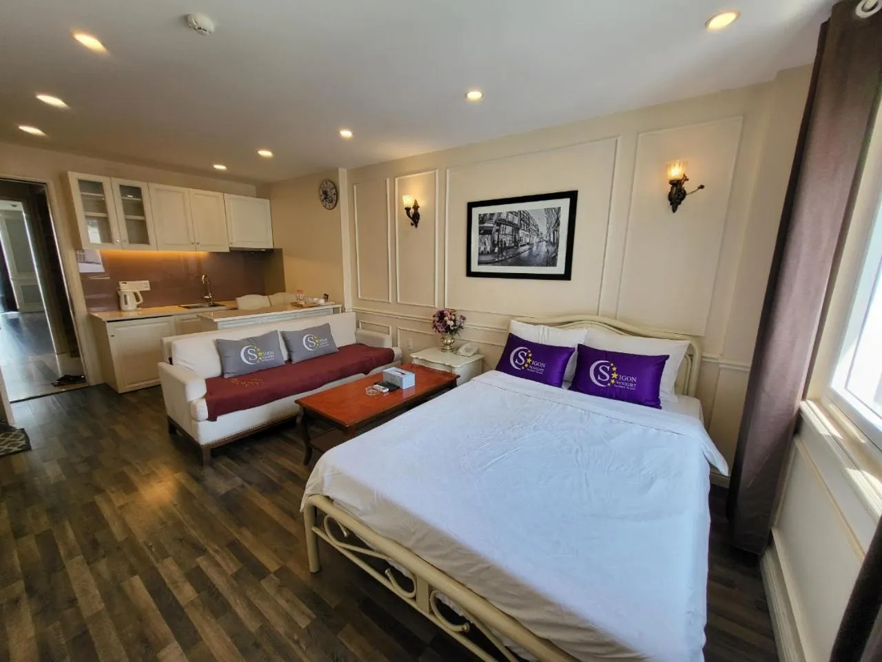 Bed in Saigon By Night Luxury Hotel