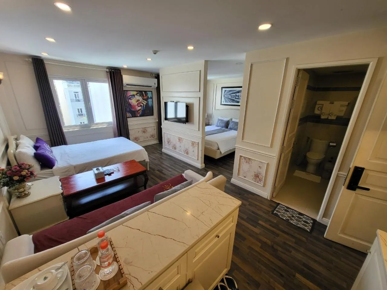 Bed in Saigon By Night Luxury Hotel