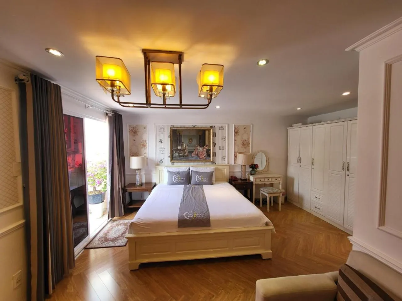 Bed in Saigon By Night Luxury Hotel