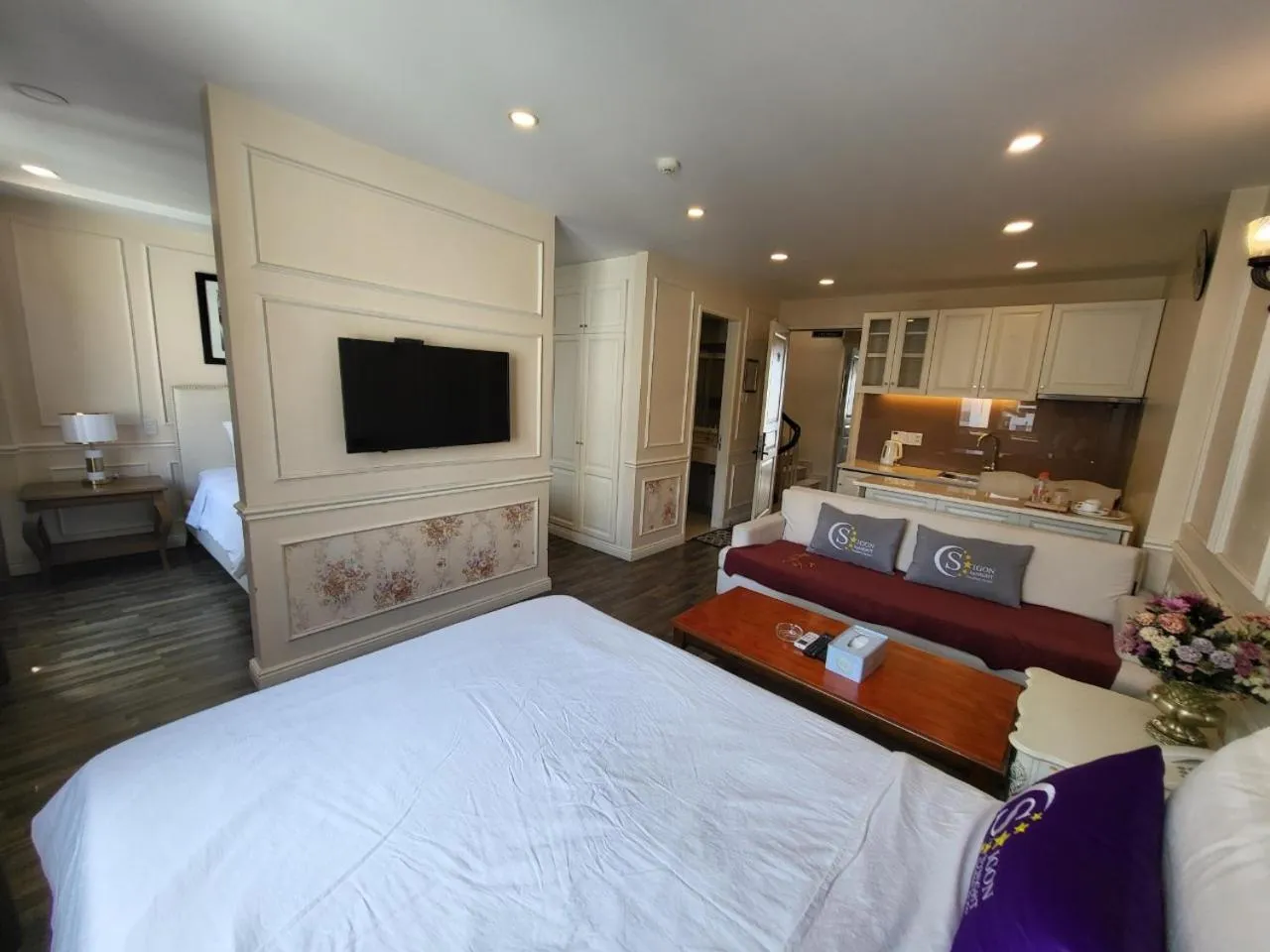 Bed in Saigon By Night Luxury Hotel