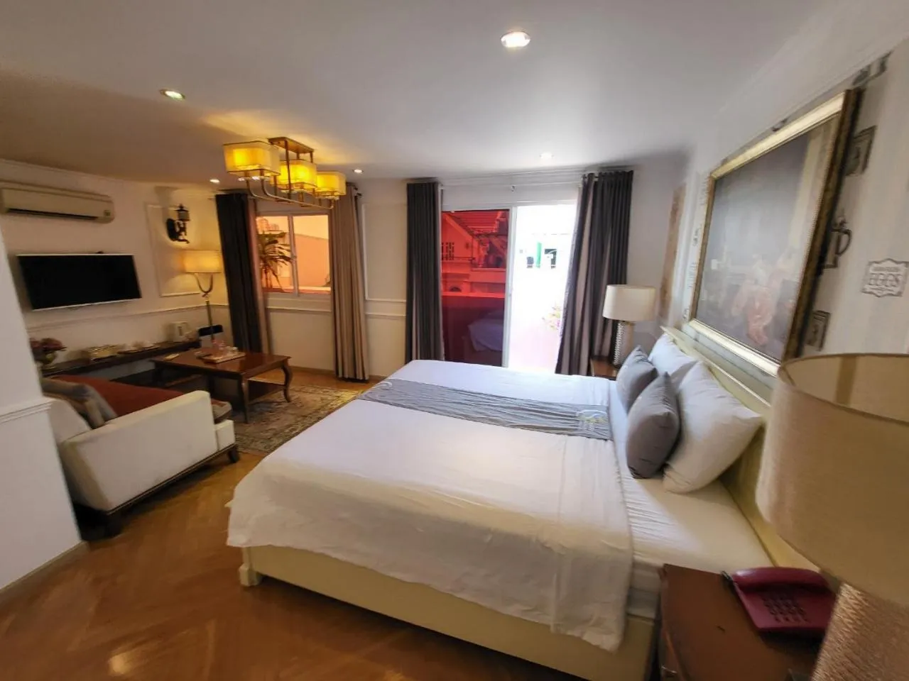 Bed in Saigon By Night Luxury Hotel