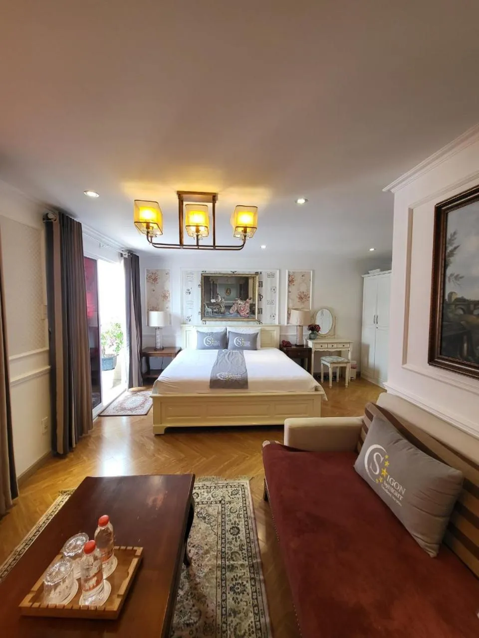 Bed in Saigon By Night Luxury Hotel