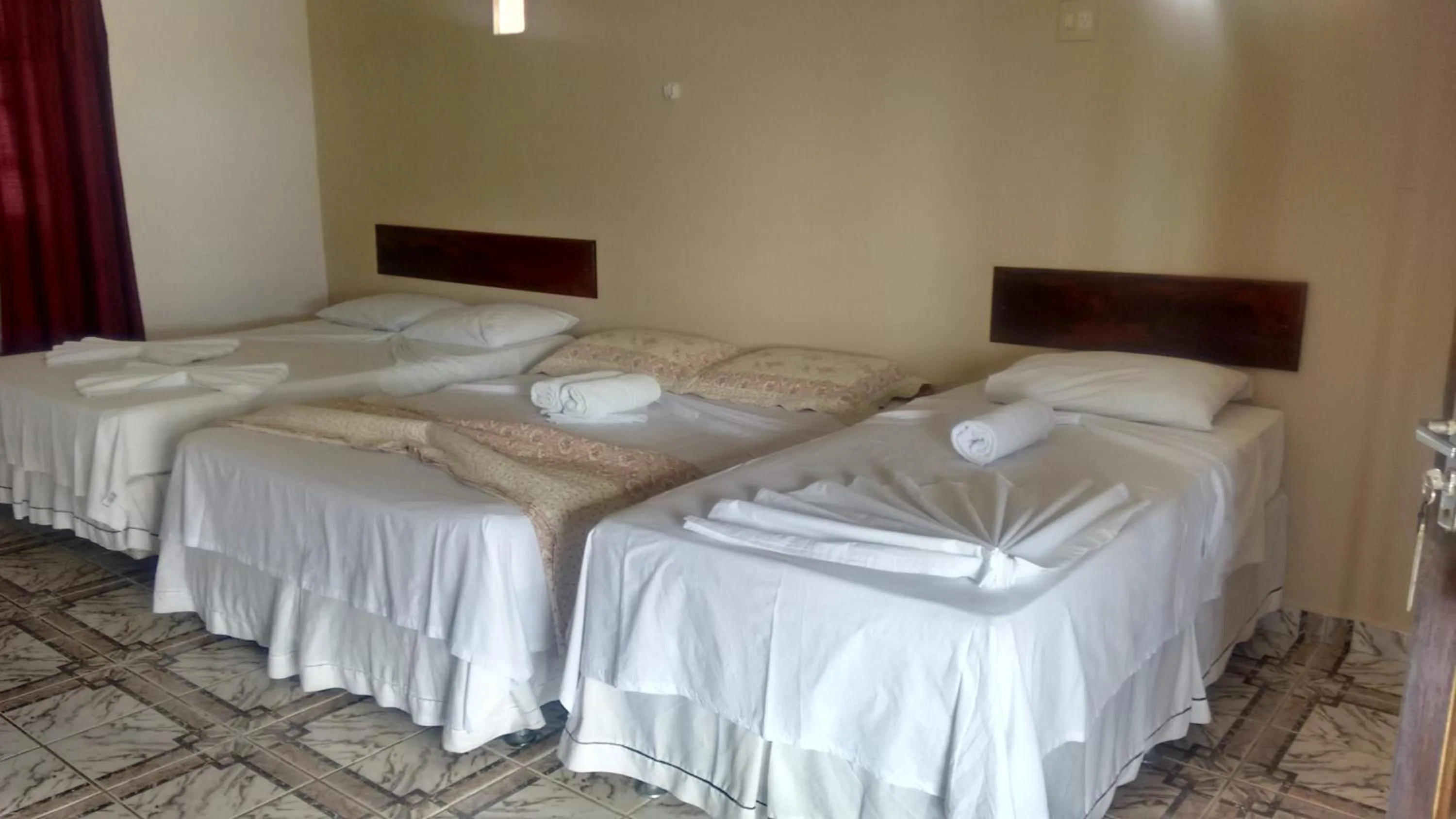 Bed in Pousada Via Lactea