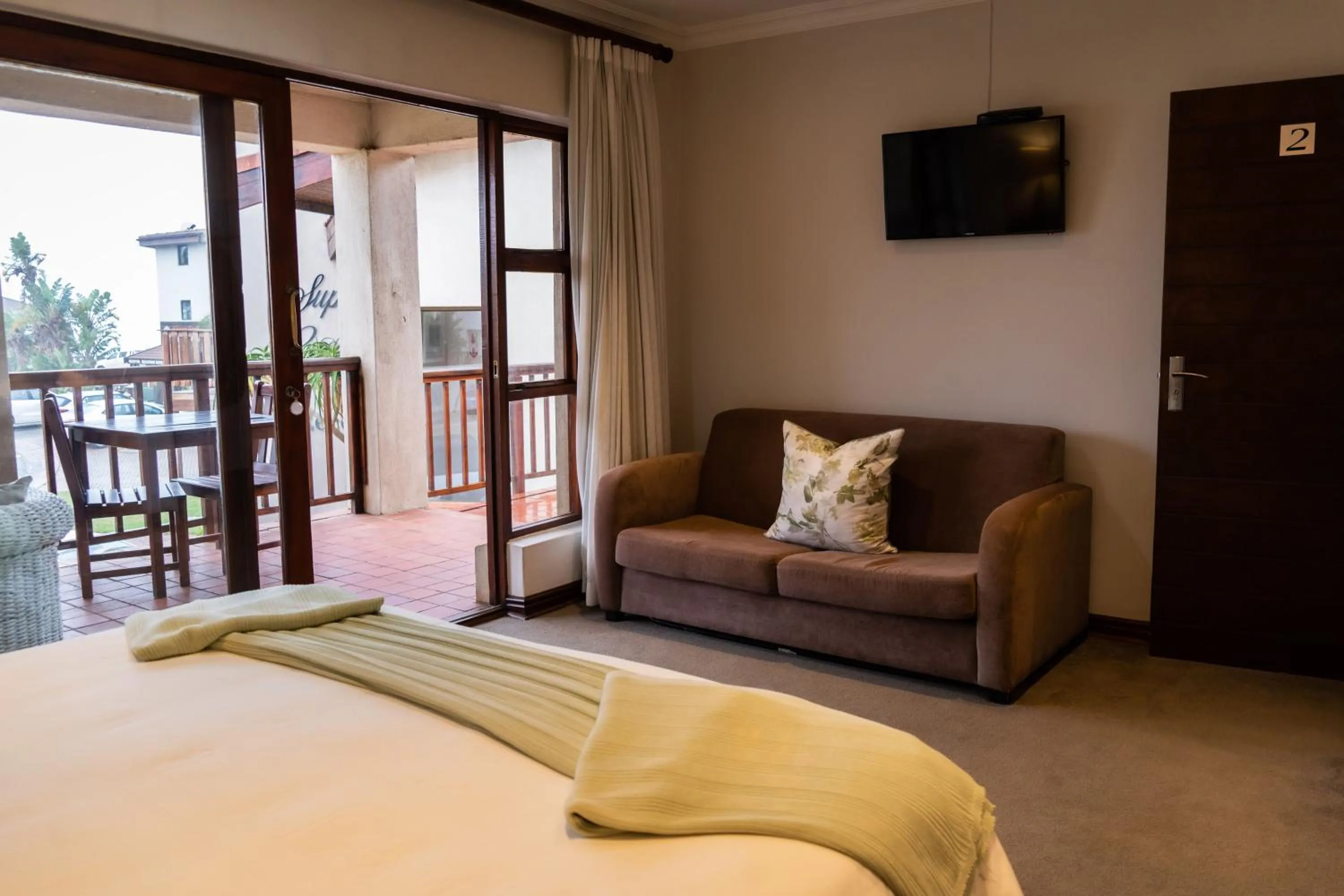 Seating area, Bed in Supertubes Guesthouse