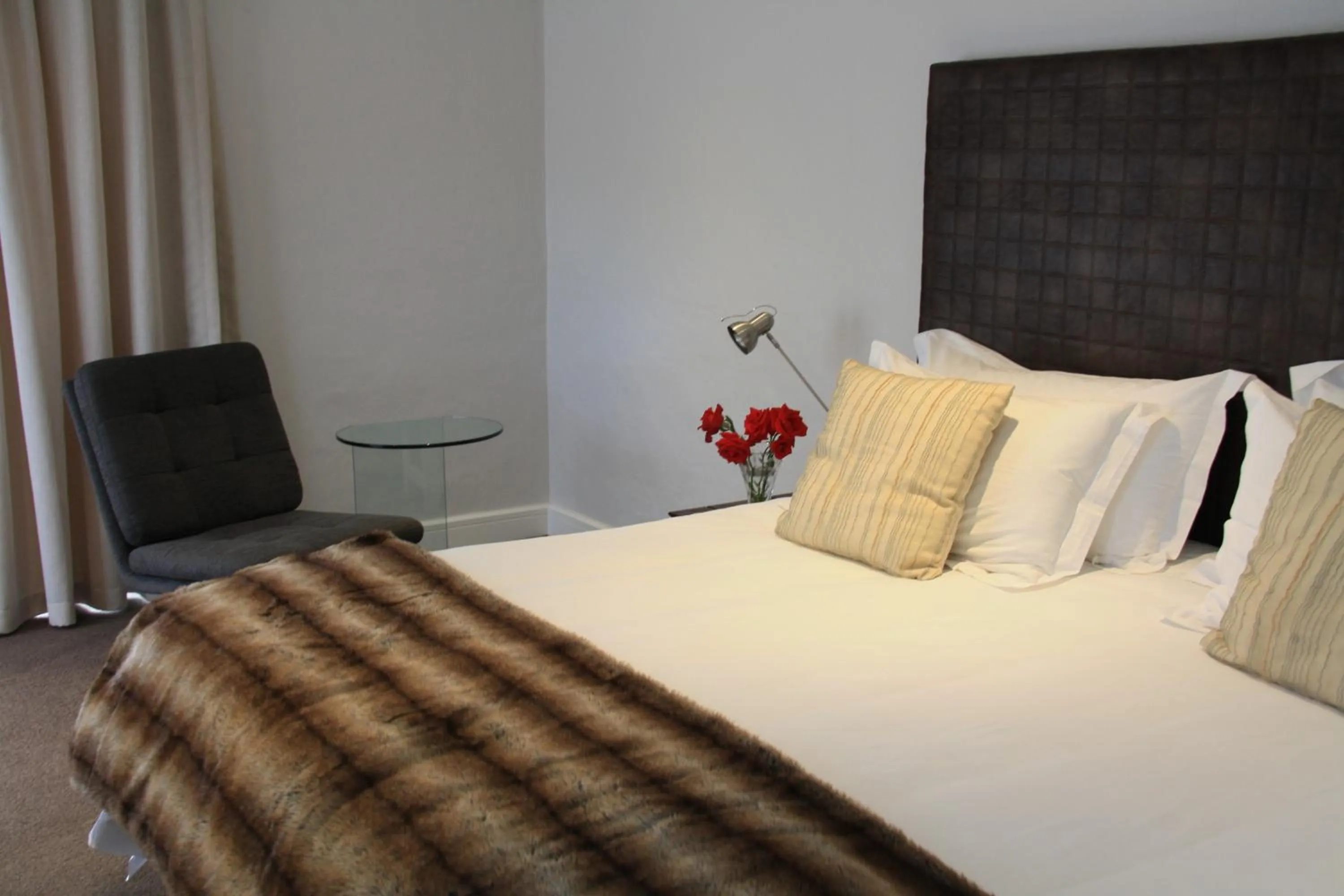 Bed in Supertubes Guesthouse