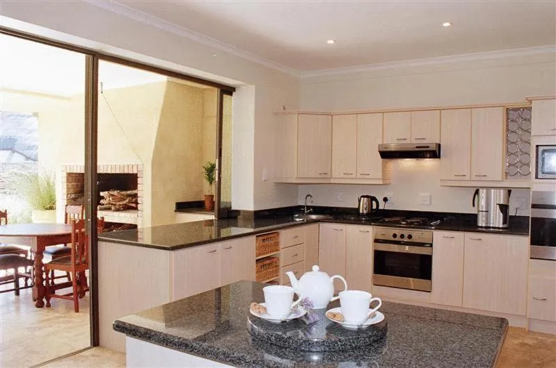 Communal lounge/ TV room in Supertubes Guesthouse