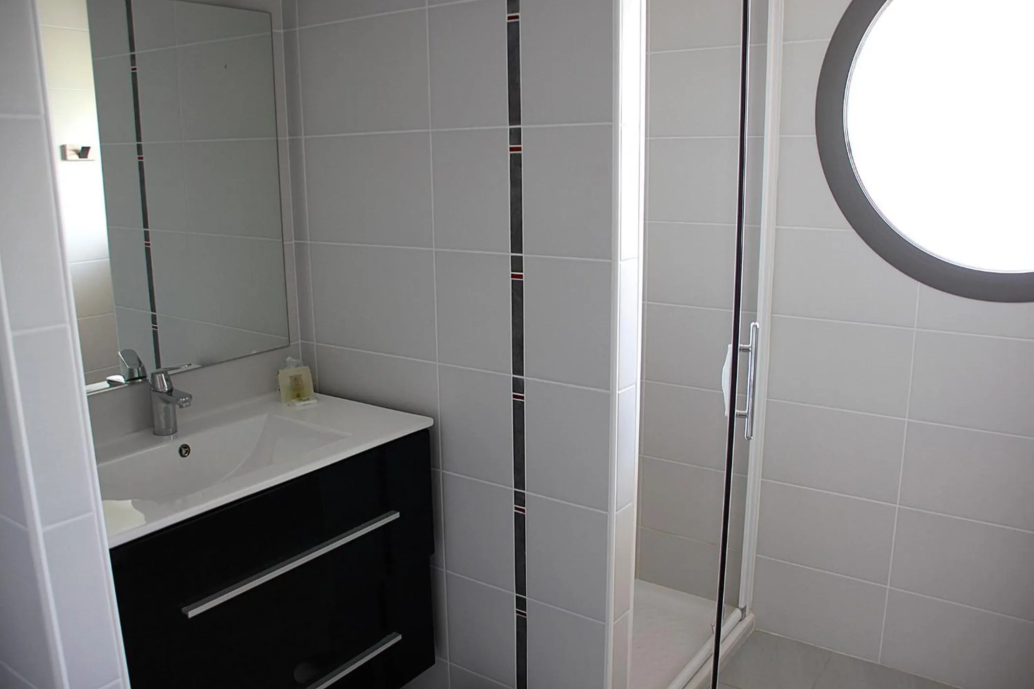 Bathroom in Logis Hotels - Hôtel et Restaurant Le Relais des Garrigues