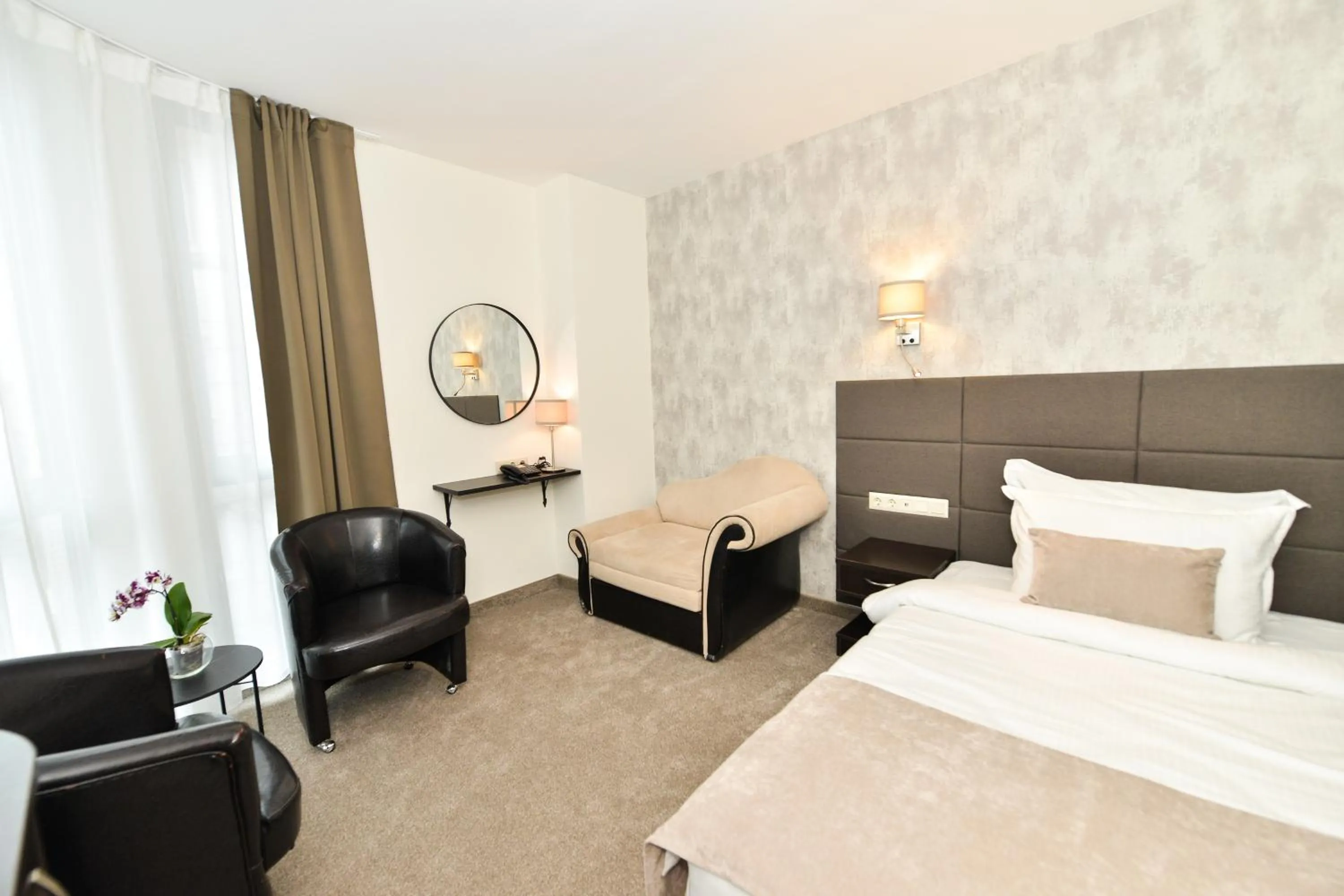 Bed in Art Plaza Hotel