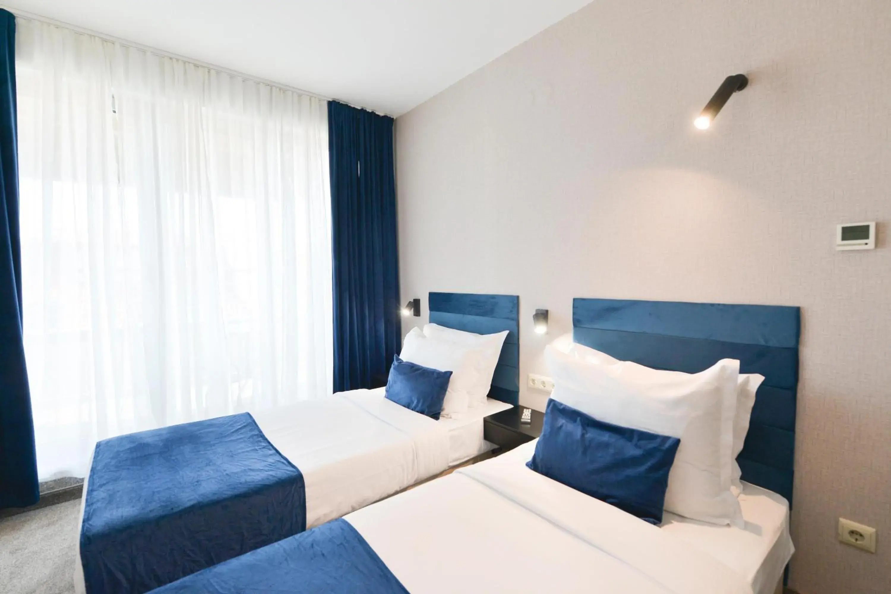 Bed in Art Plaza Hotel Bed in Art Plaza Hotel