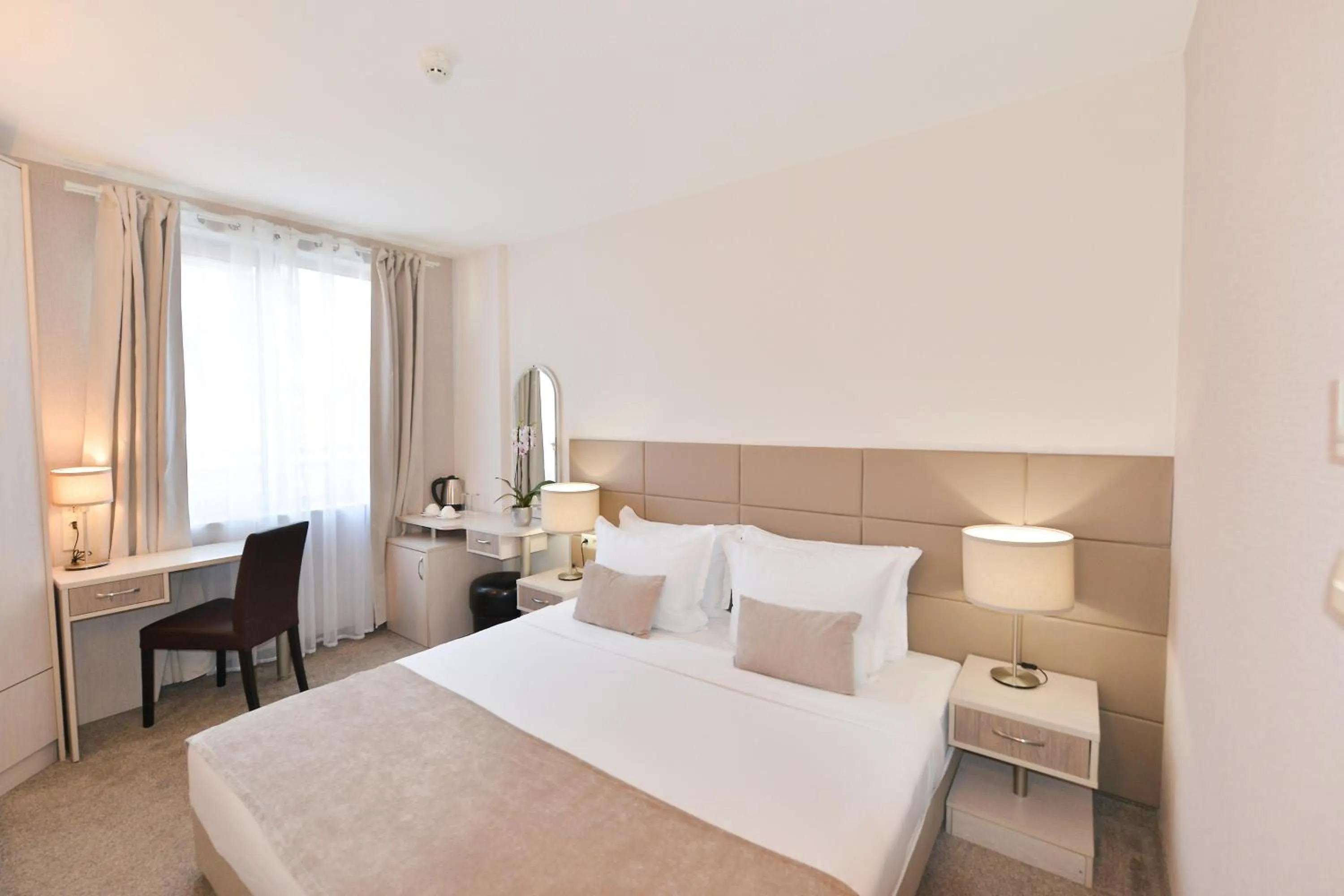 Bed in Art Plaza Hotel