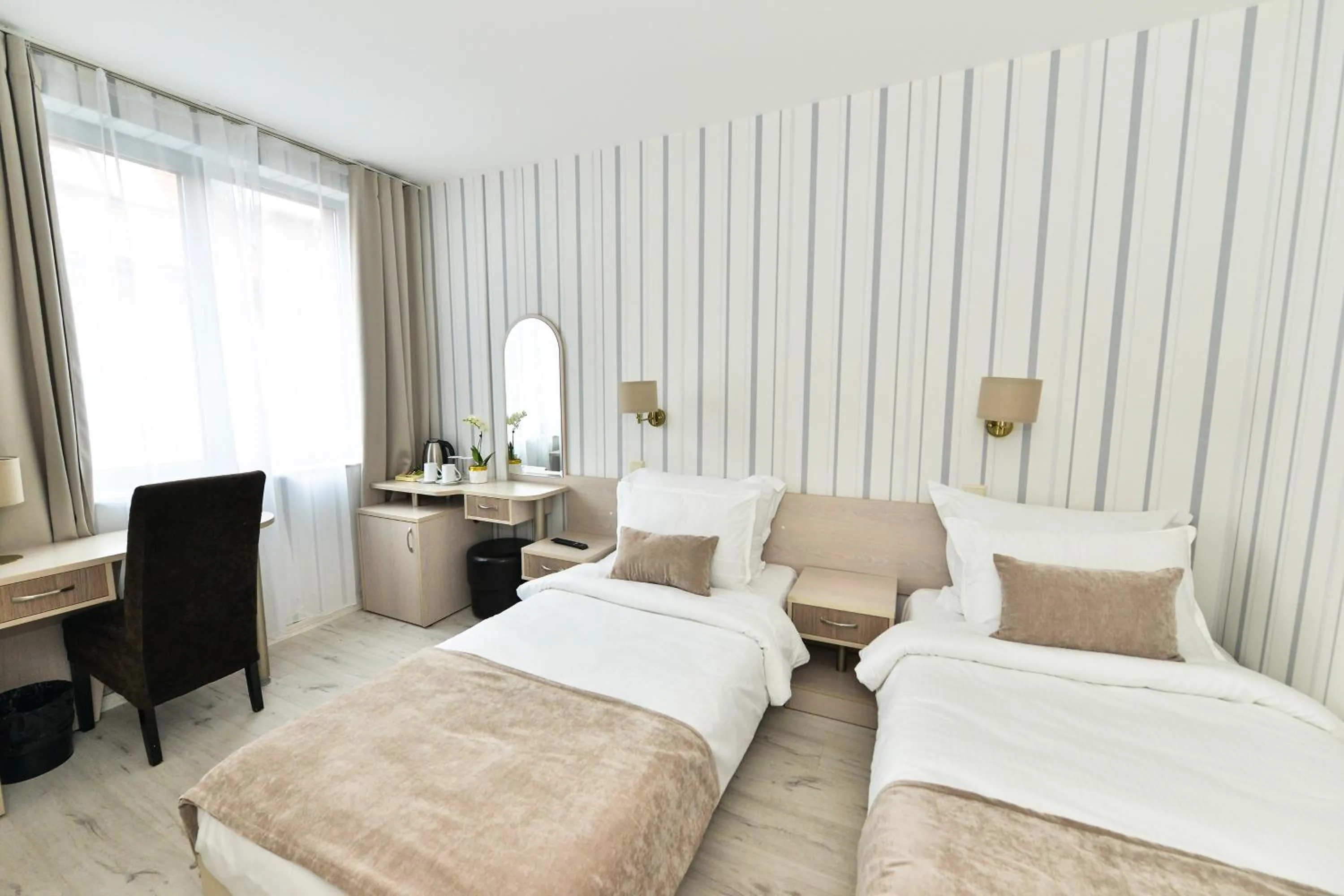 Bed in Art Plaza Hotel