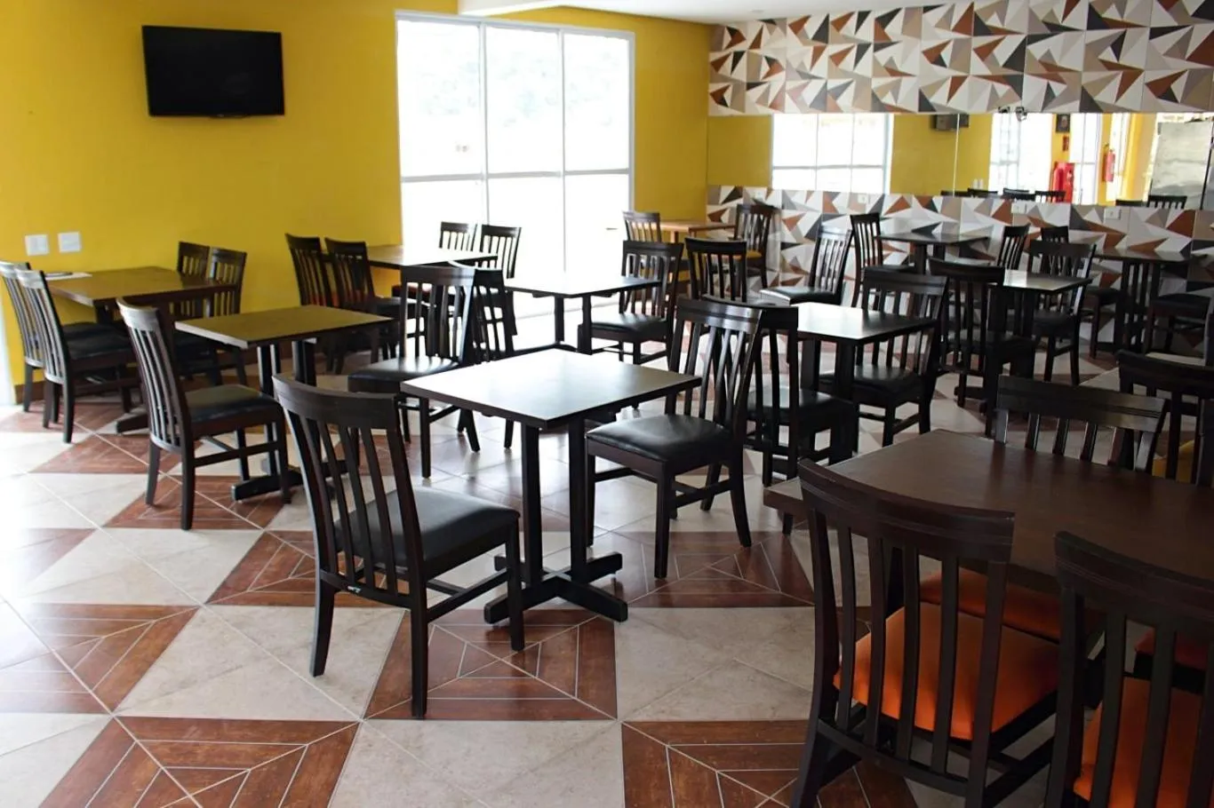 Dining area in Don Marcos Hotel com Restaurante e Pizzaria