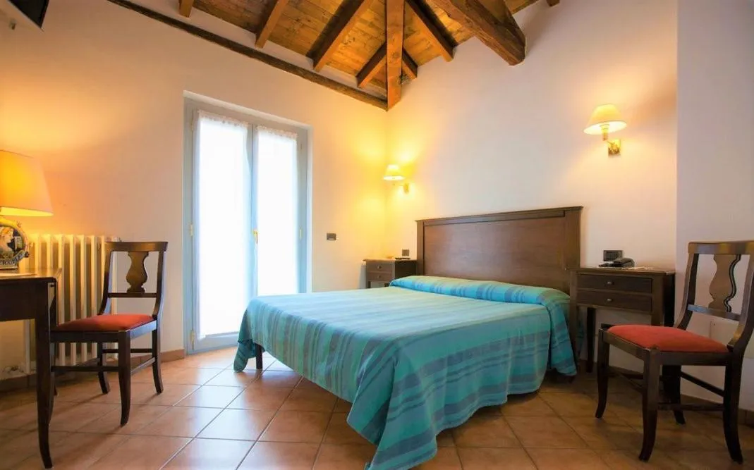 Bed in Hotel La Locanda