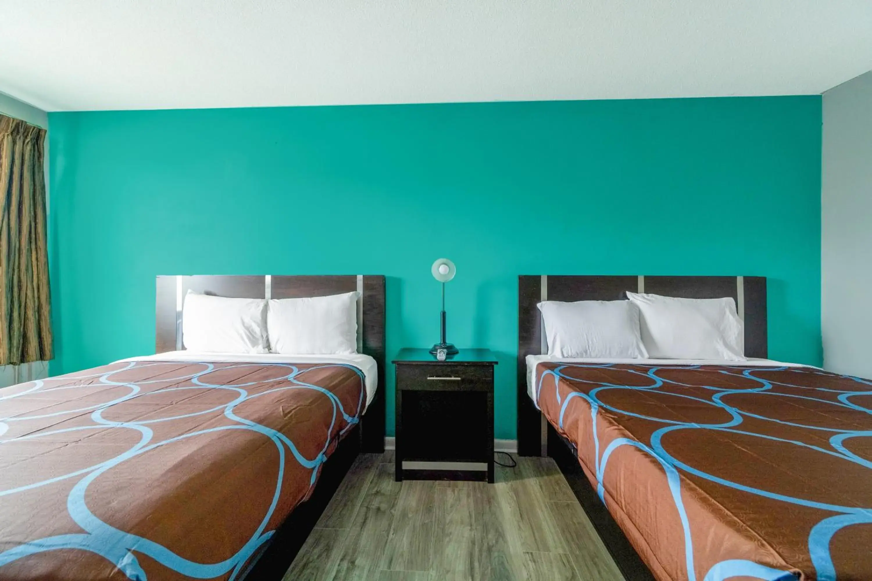 Bedroom in Lamplighter Inn By OYO Independence Bedroom in Lamplighter Inn By OYO Independence