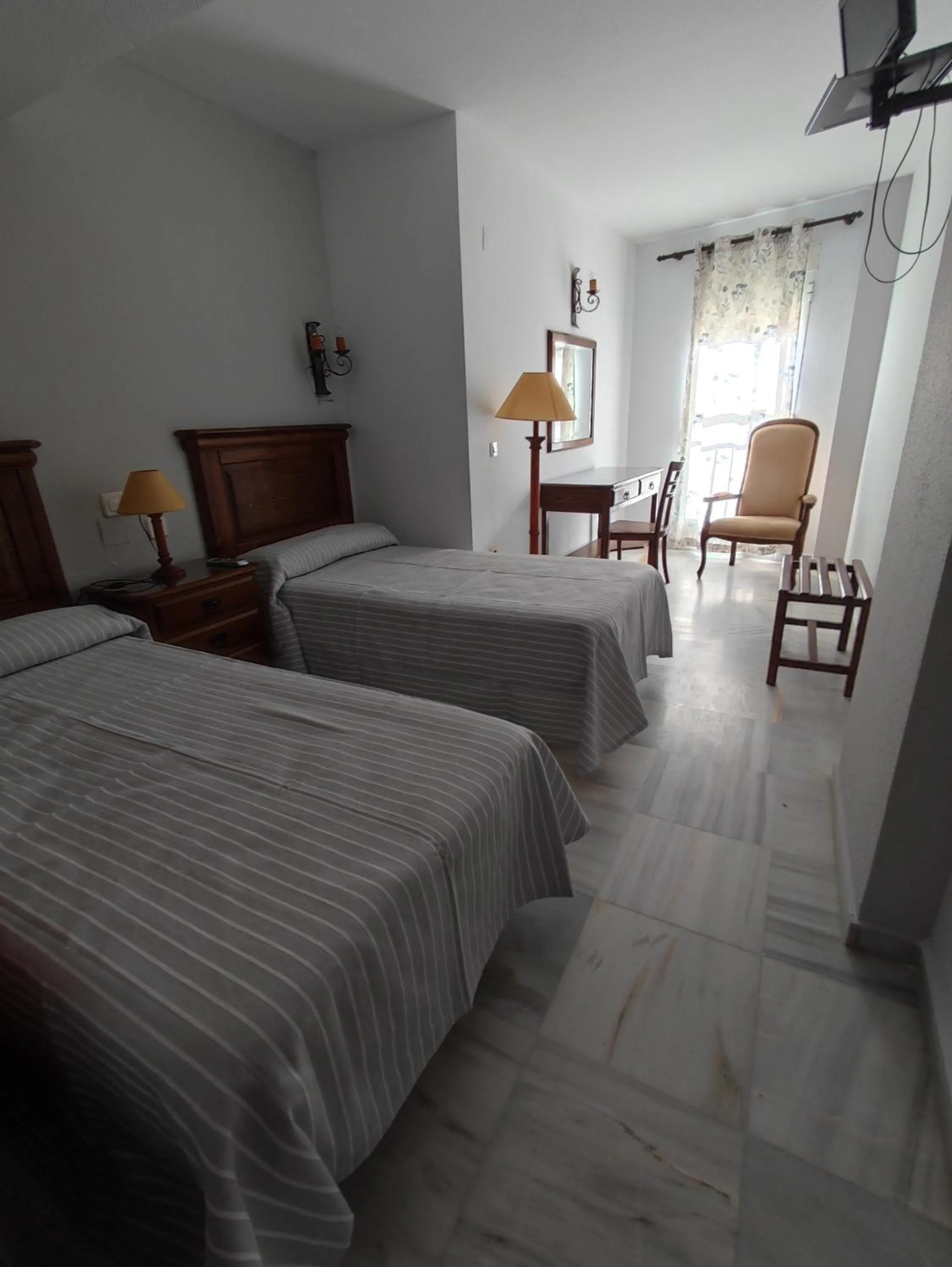 Bed in Hotel Cervantes