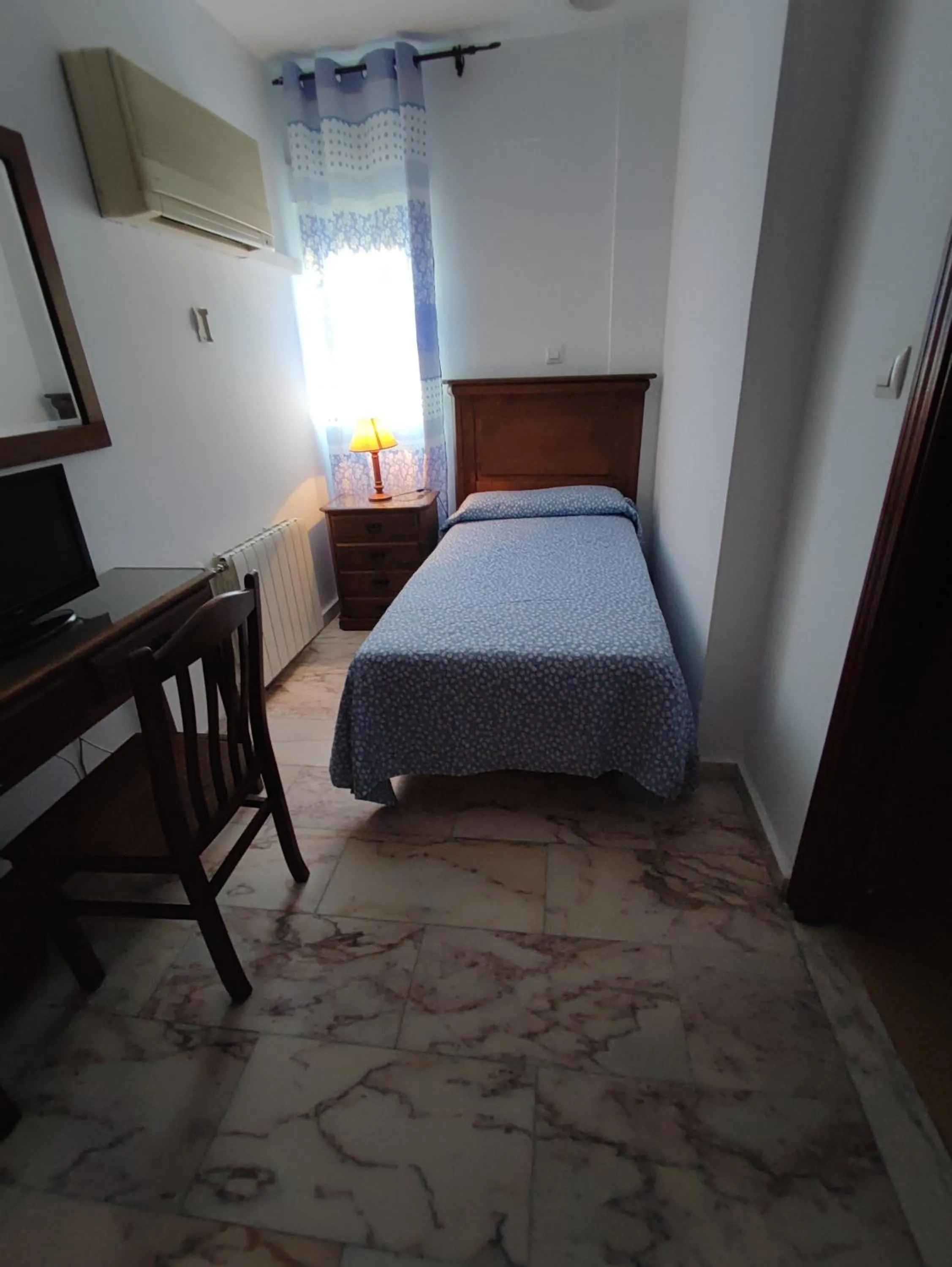 Bed in Hotel Cervantes