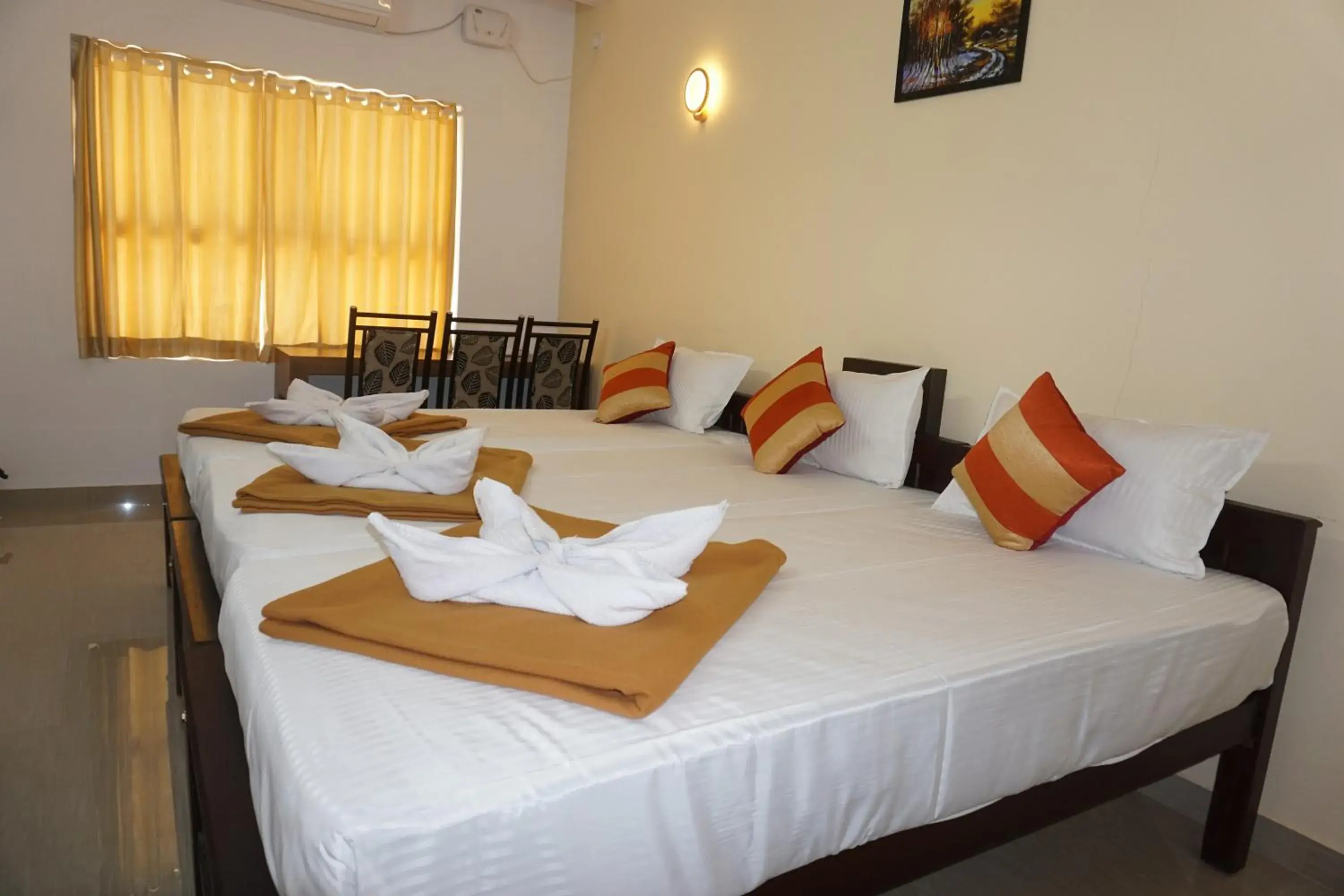 Budget Triple Room in Hisham Residency Budget Triple Room in Hisham Residency