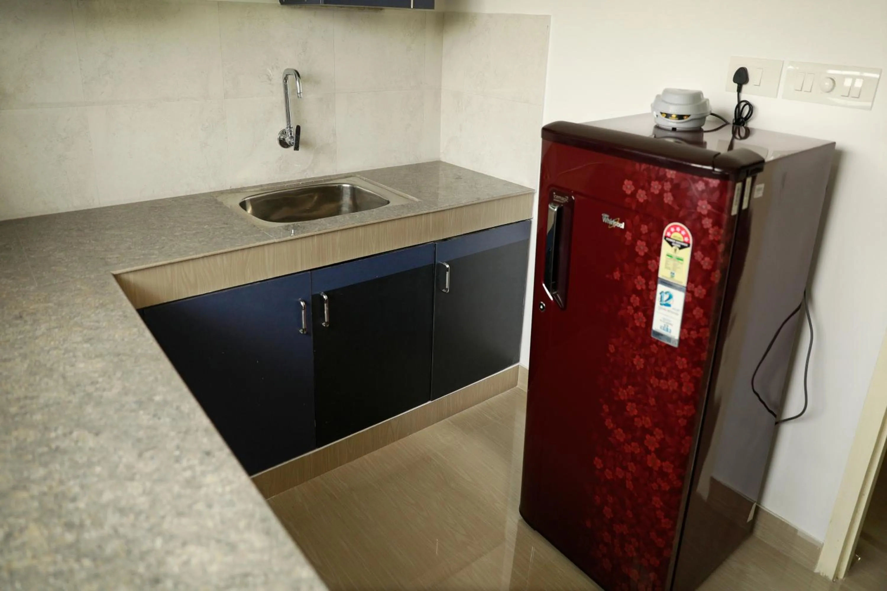 Kitchen or kitchenette in Hisham Residency