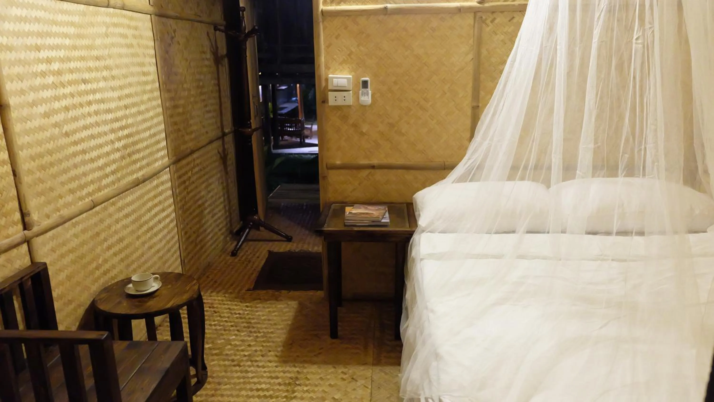 Bed in Lanna House Lanna Hut Chiangmai