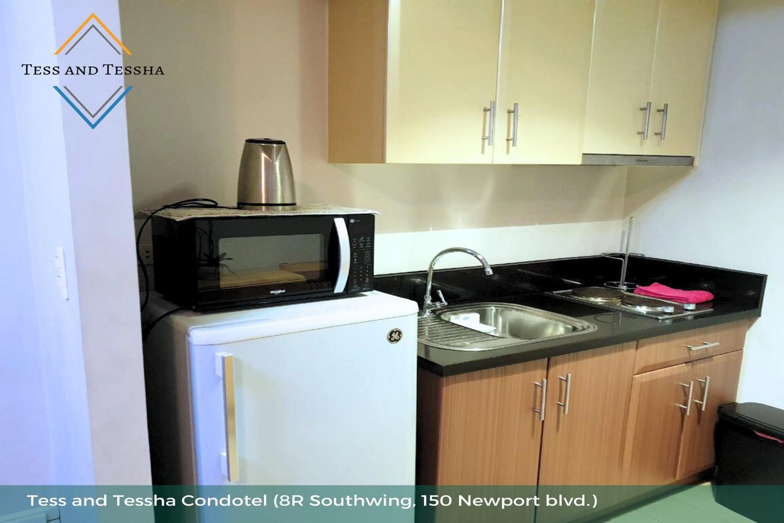 Kitchen or kitchenette in Tess and Tessha Condotel near T3 Airport