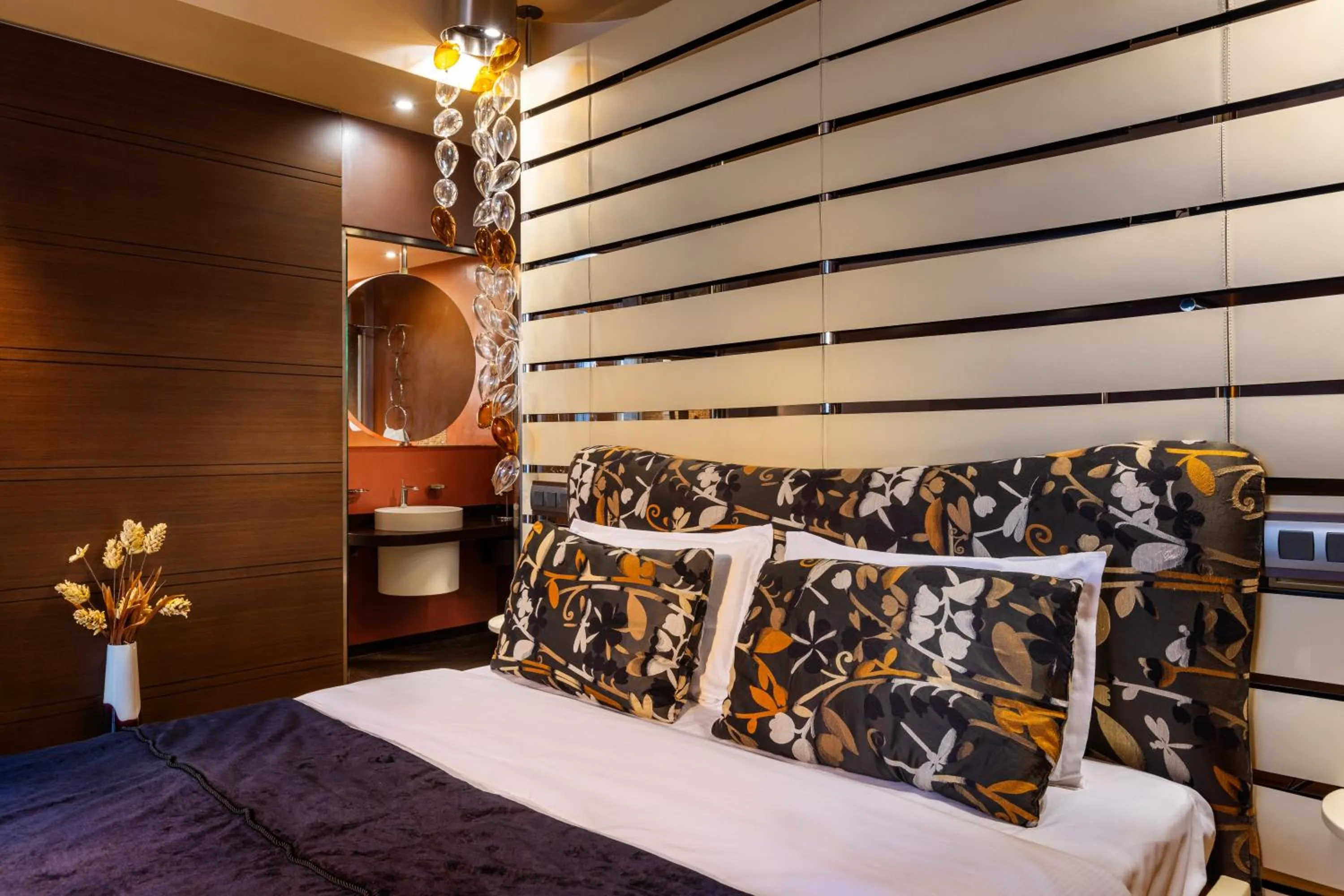 Bed in Les Fleurs Boutique Hotel