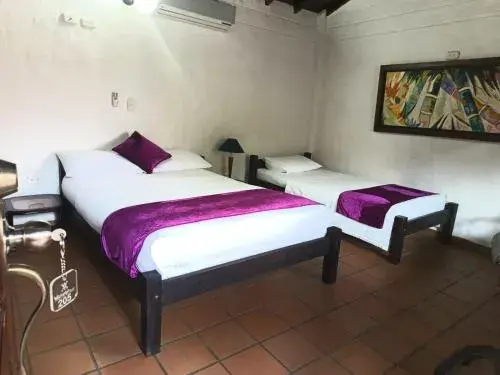 Triple Room in Hotel Verano Resort San Gil Triple Room in Hotel Verano Resort San Gil