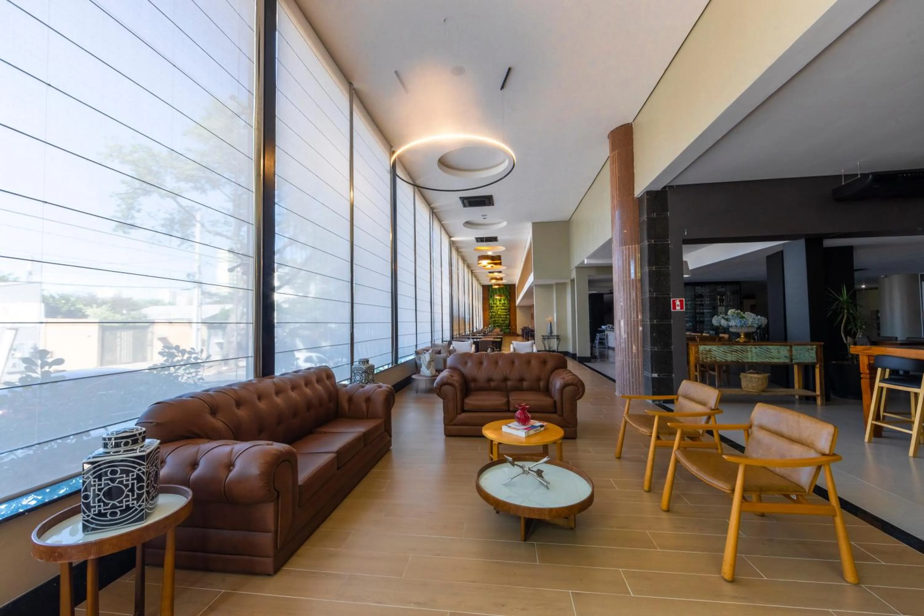 Seating area in Wyndham Golden Foz Suítes