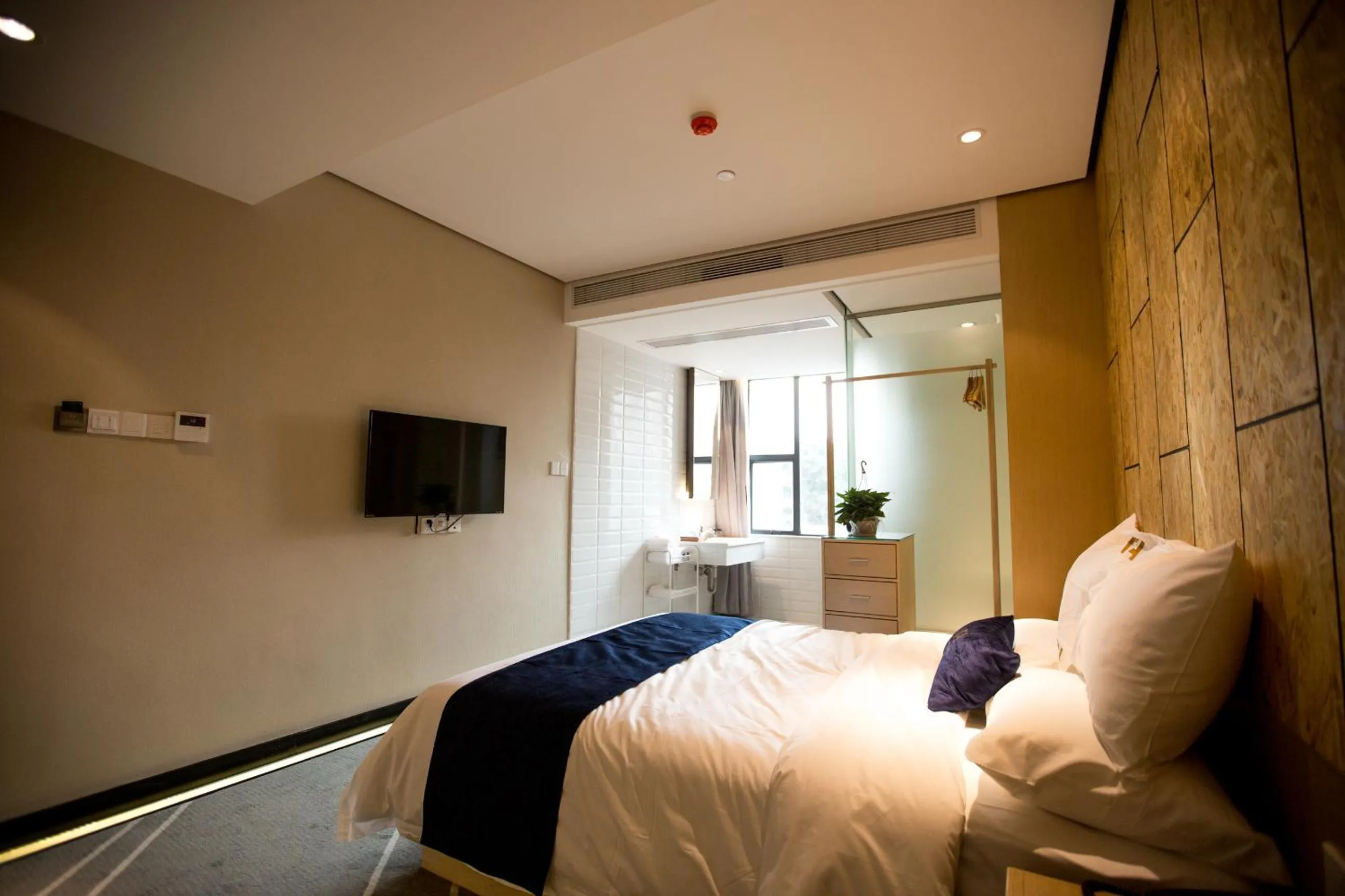 TV/Entertainment Center in Arrivee Hotel