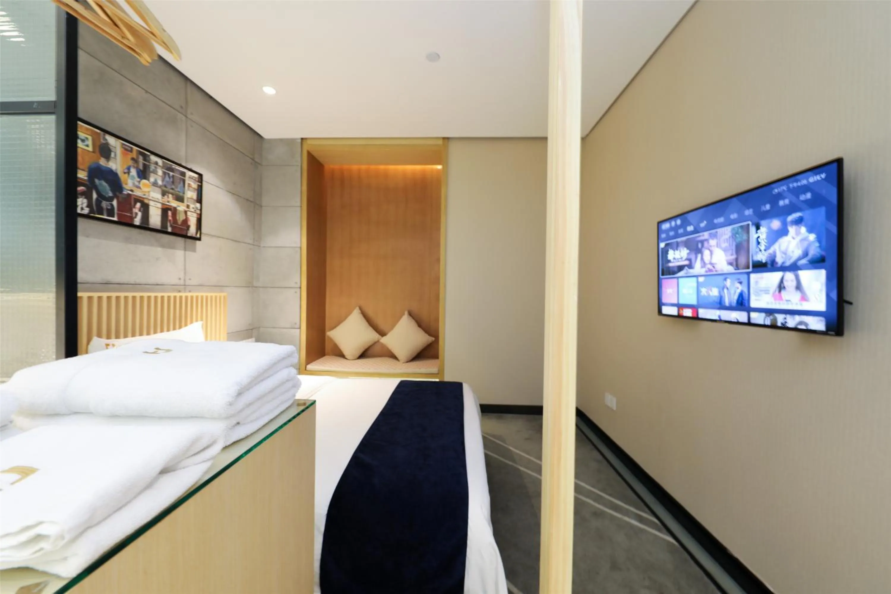 TV/Entertainment Center in Arrivee Hotel